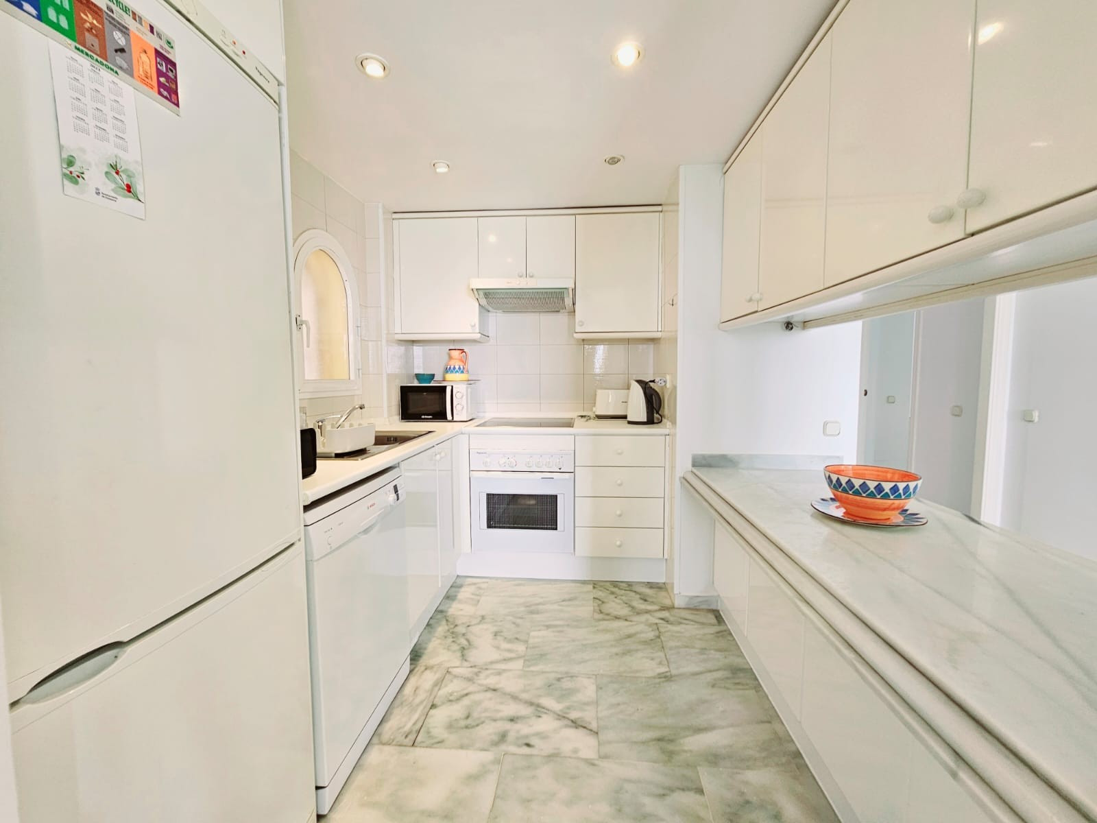 Fantastic ground floor apartment with a beachfront garden set in a small private complex with direct access to the beach in Estepona