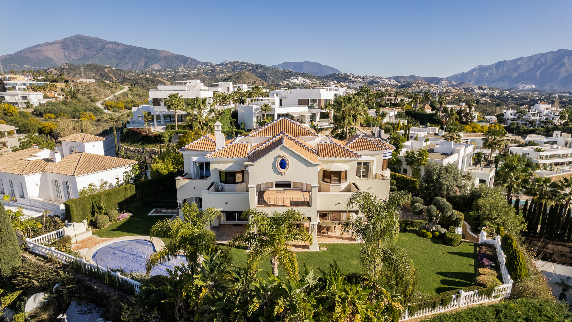 Classic-style, five-bedroom villa with panoramic sea and golf views set in the prestigious area of La Alqueria