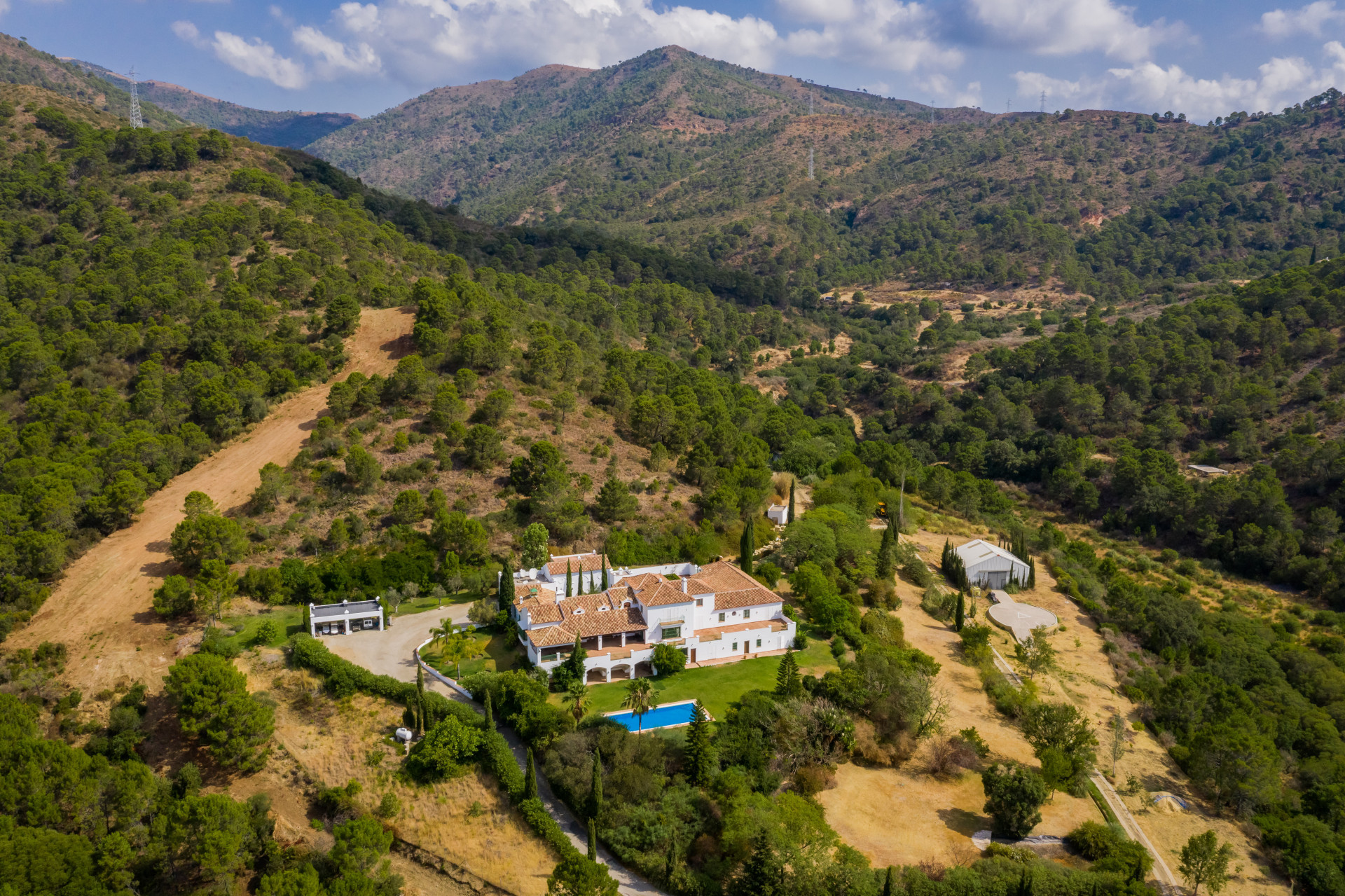 Qlistings - Unique Andalusian-style country estate with heliport and hangar for sale in El Velerin, Estepona Property Image