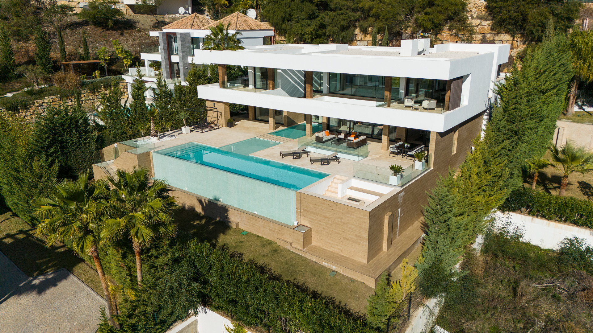 Qlistings - Ultra-Modern Sea View Villa with Gym for Sale in La Alqueria, Benahavis Property Image