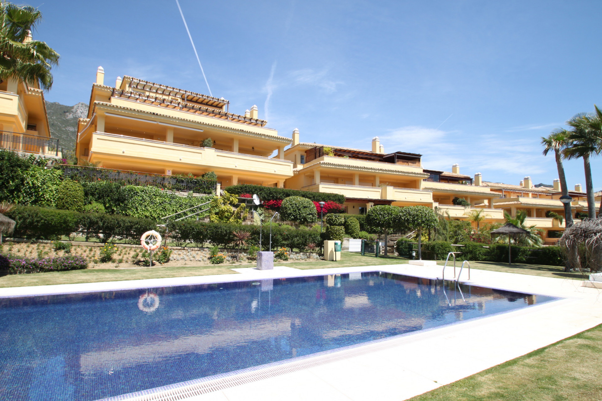 Modern ground floor apartment with sea views above Marbella's Golden Mile