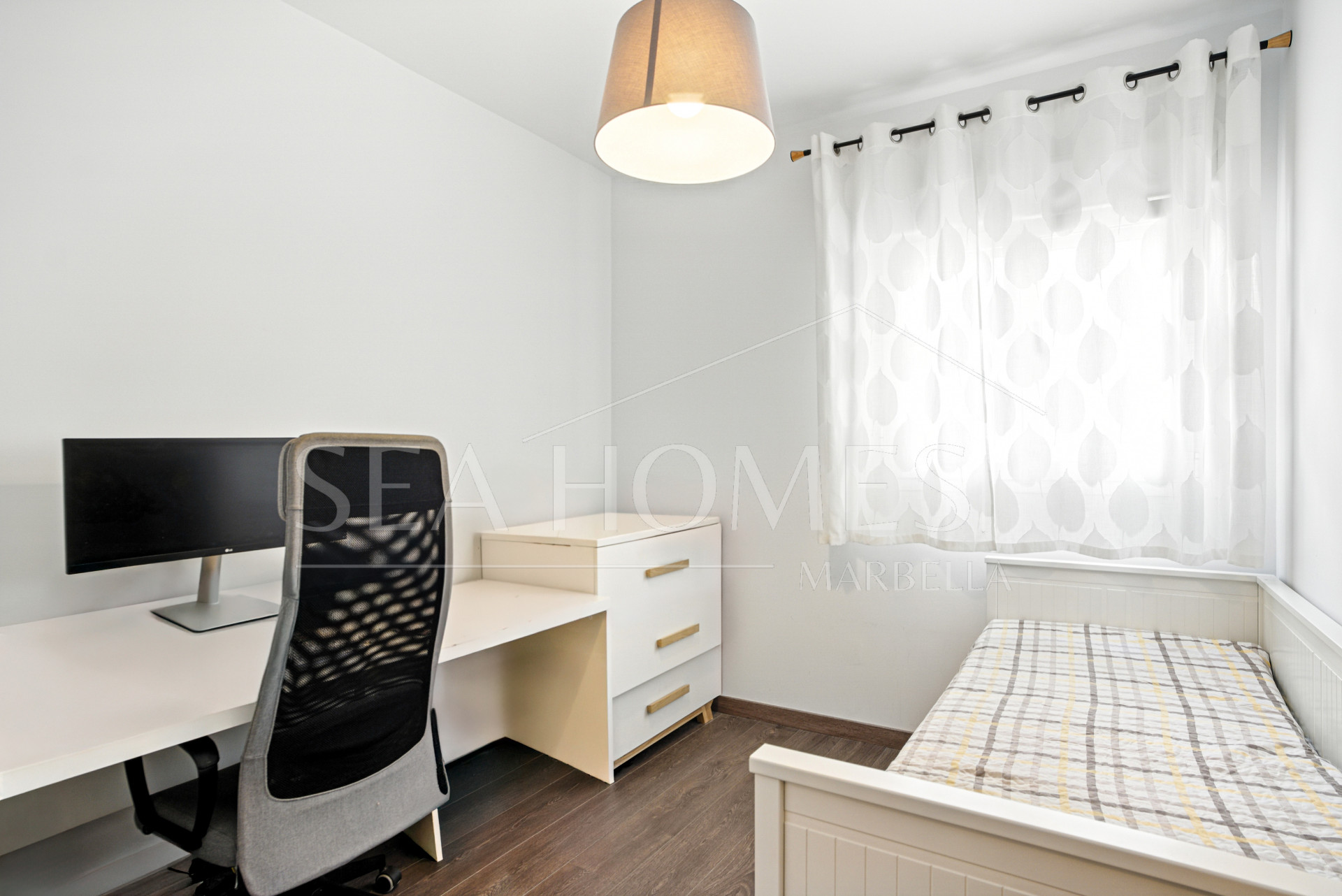 Beautiful south facing, three bed apartment located in the gated community of Estepona Gardens