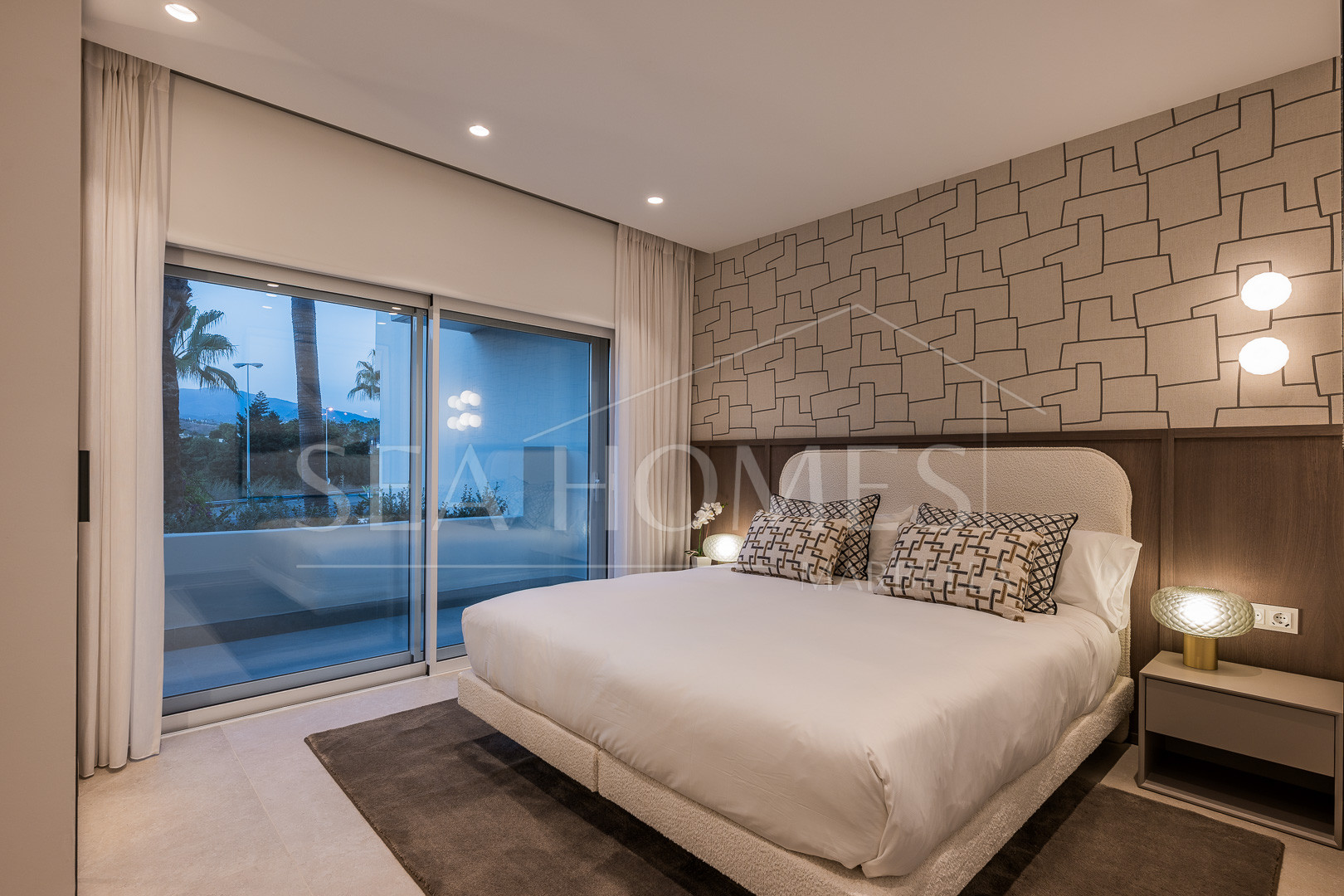 Beautifully renovated, south facing three-bedroom apartment located  in the prestigious gated community of Bahia del Velerin, Estepona