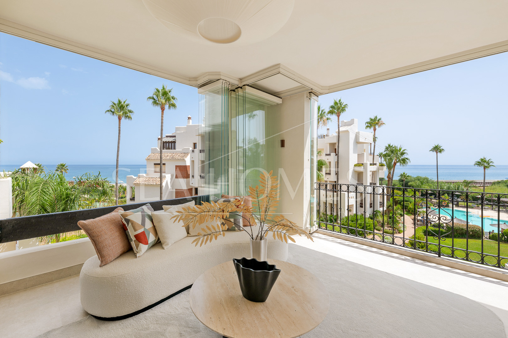 Beautifully renovated, south facing three-bedroom apartment located  in the prestigious gated community of Bahia del Velerin, Estepona