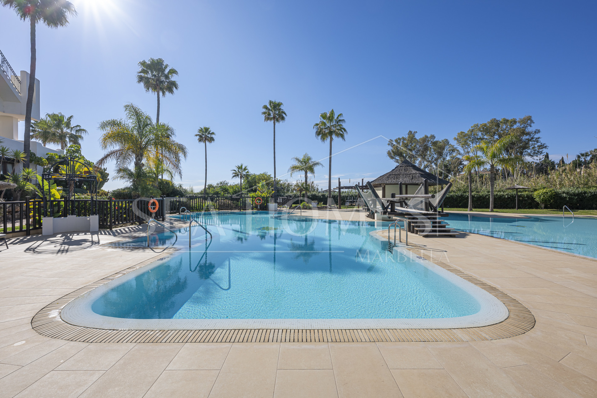 Beautifully renovated, south facing three-bedroom apartment located  in the prestigious gated community of Bahia del Velerin, Estepona