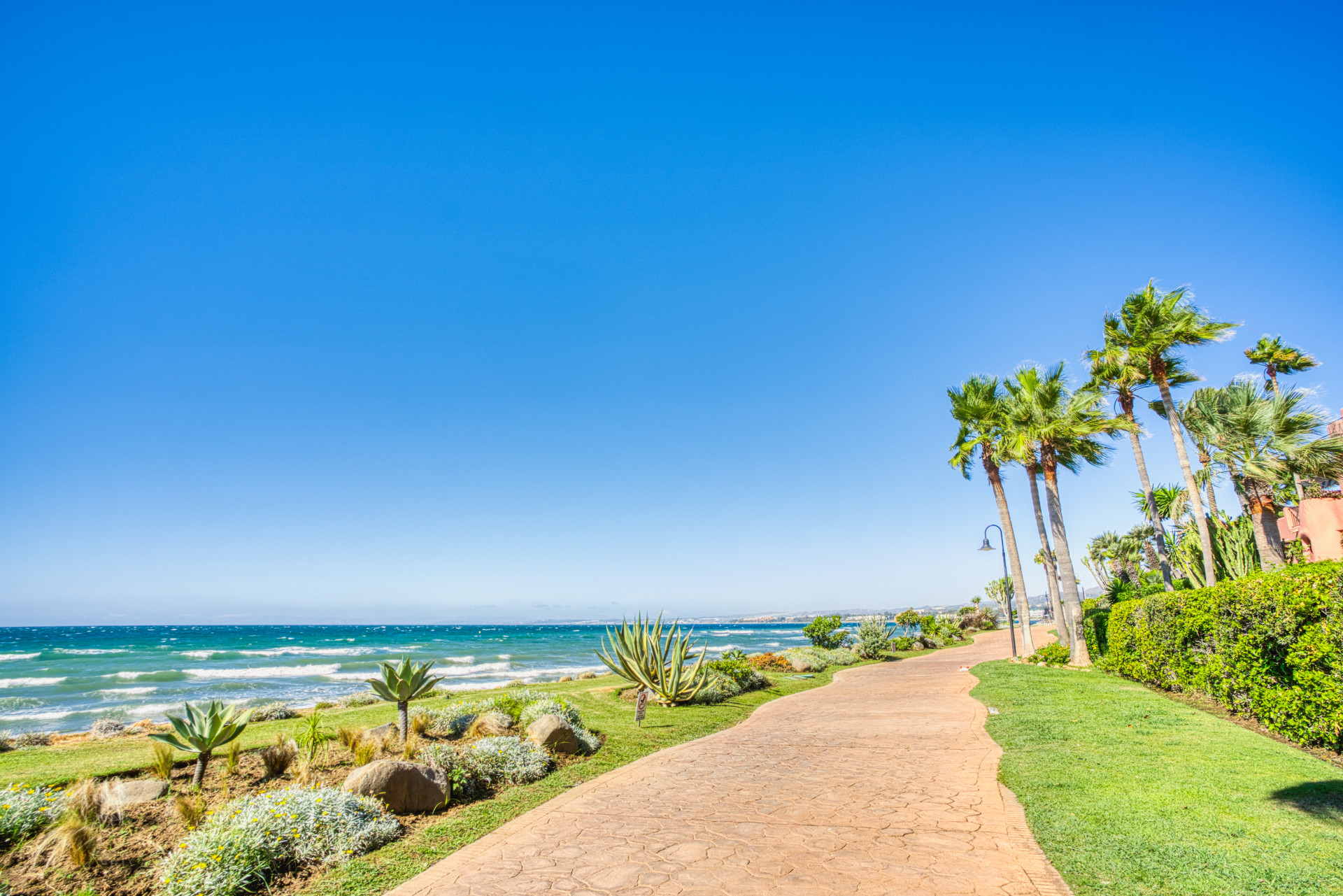 Immaculate three bedroom west facing ground floor apartment in the prestigious and gated beachfront community Menara Beach