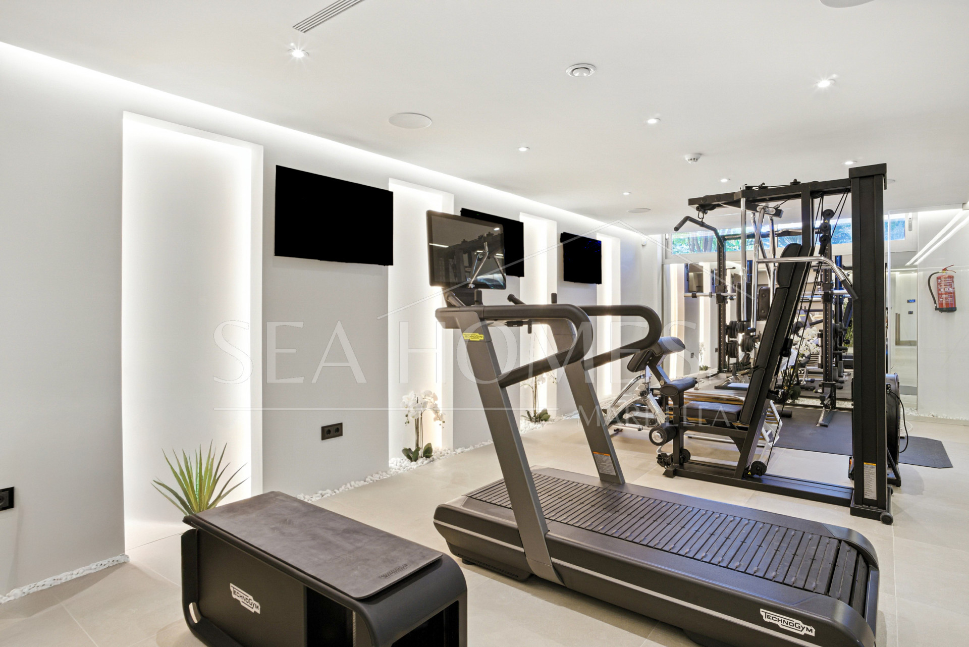 An architecturally unique, south-facing property located in the exclusive gated community of Sierra Blanca on Marbella’s prestigious Golden Mile