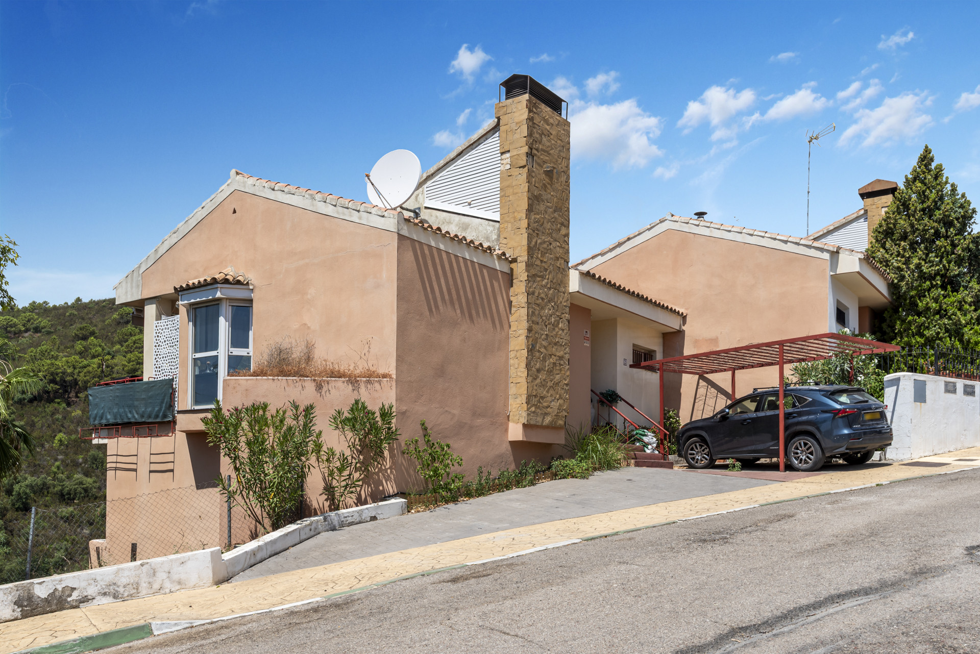 Tranquil Three Bedroom Southwest-Facing Townhouse with Mountain Views located in Jardines de Lomas Alta, Estepona