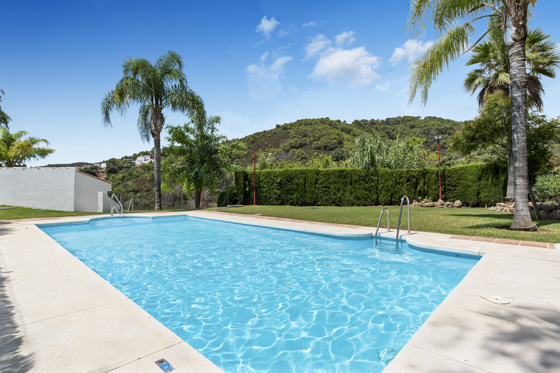 Tranquil Three Bedroom Southwest-Facing Townhouse with Mountain Views located in Jardines de Lomas Alta, Estepona