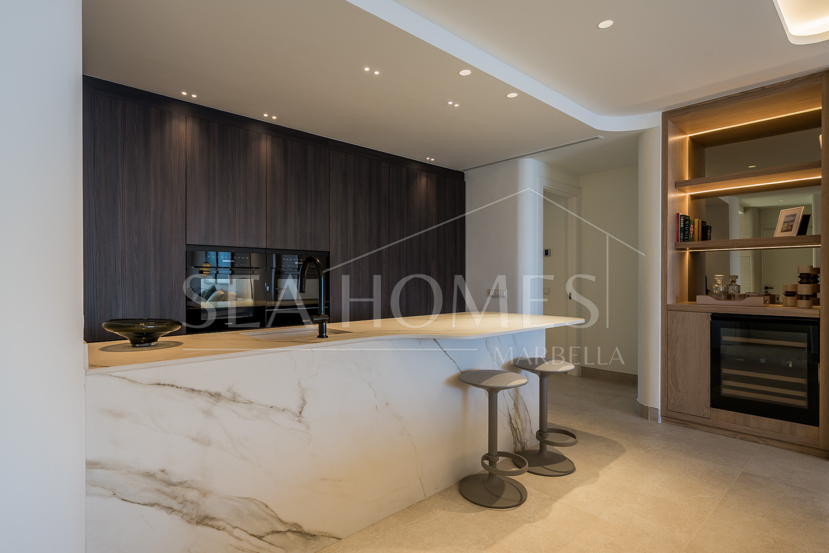 Beautifully renovated, south facing three bedroom penthouse located in prestigious beachfront community Bahia del Velerin, Estepona.