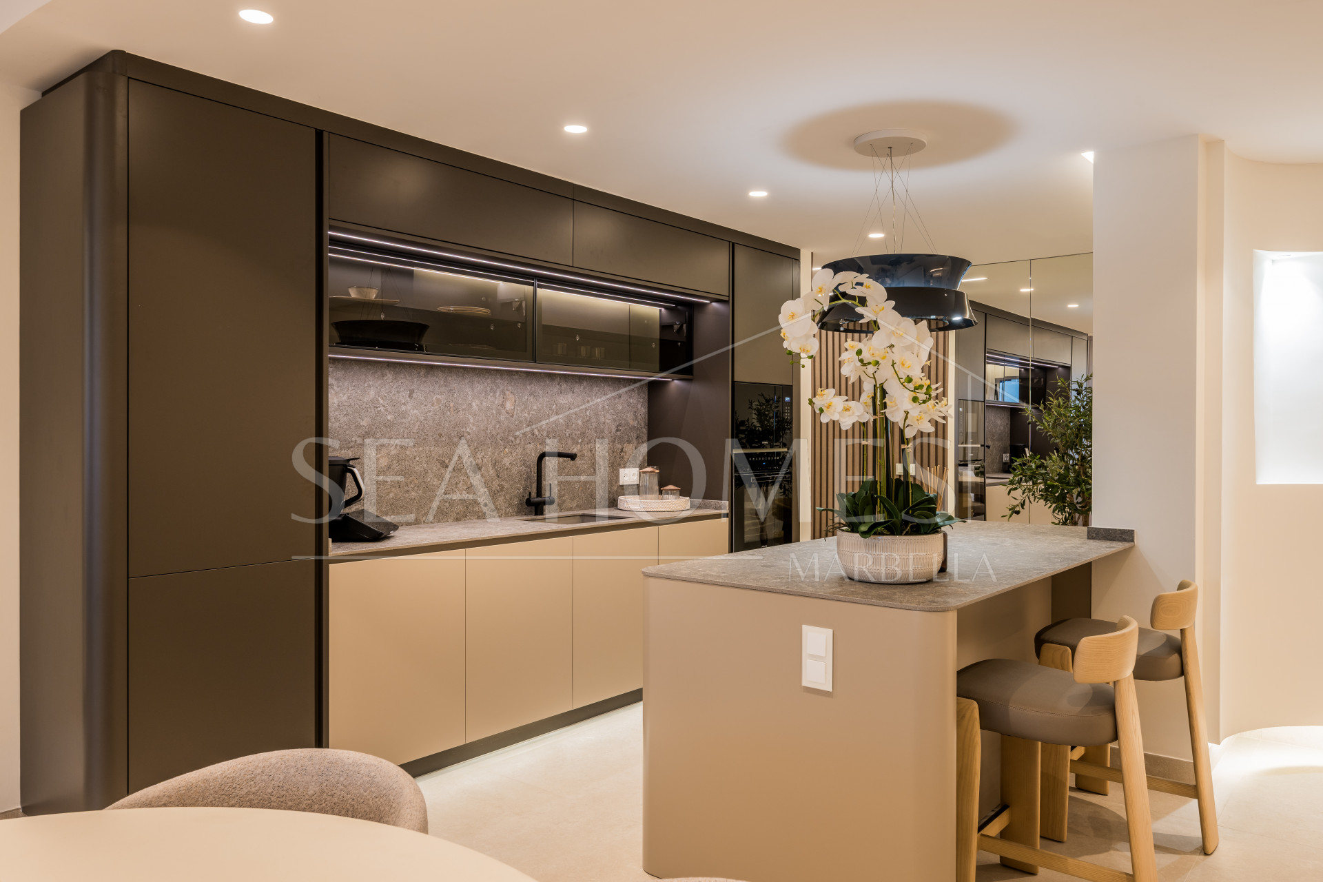 Stunning south-facing three bedroom penthouse located in the exclusive gated community of Bahia Del Velerin, Estepona.