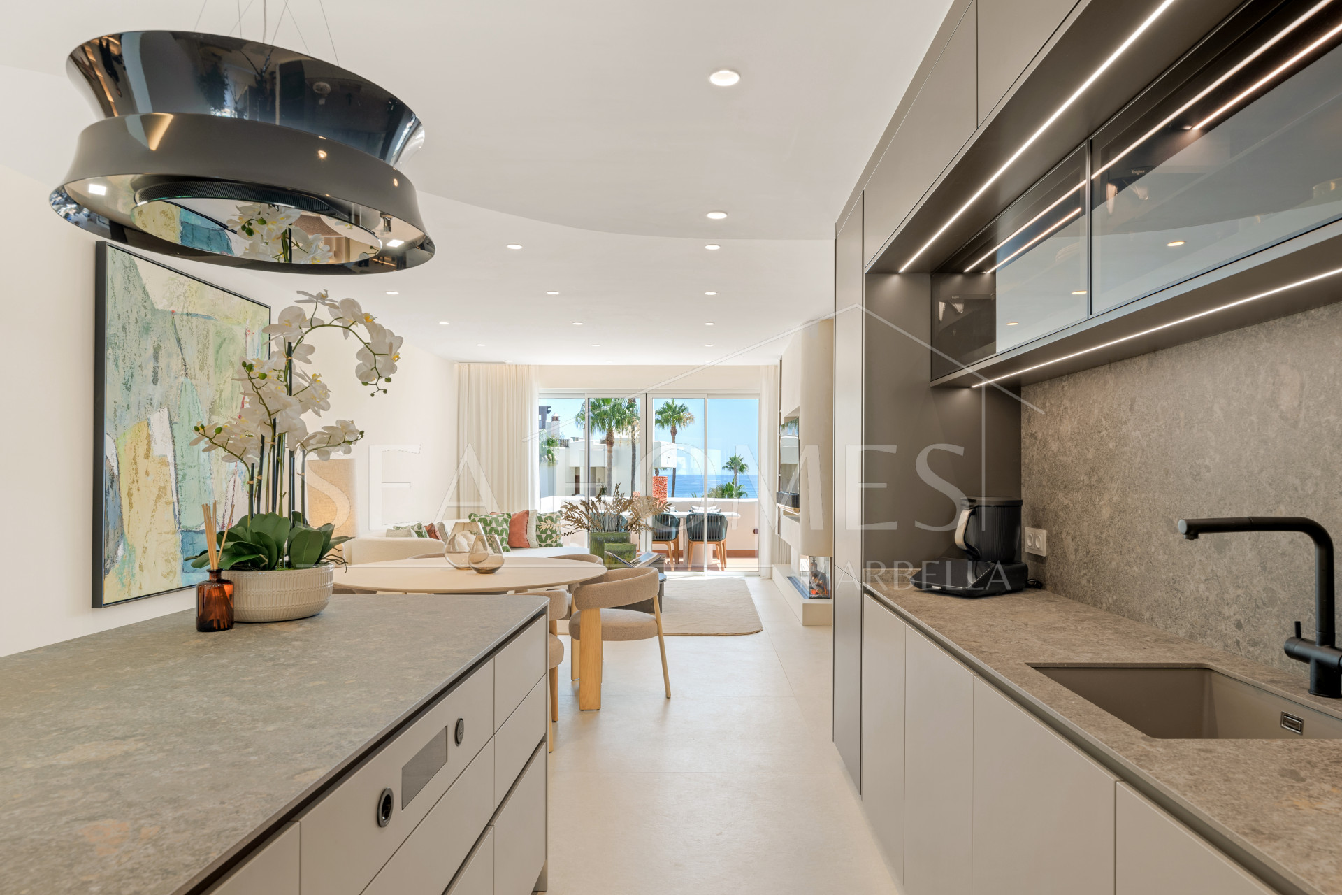 Stunning south-facing three bedroom penthouse located in the exclusive gated community of Bahia Del Velerin, Estepona.