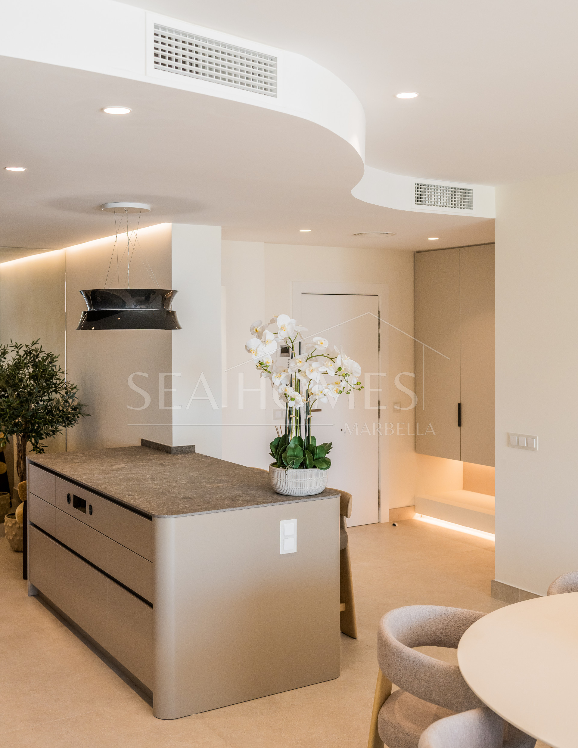 Stunning south-facing three bedroom penthouse located in the exclusive gated community of Bahia Del Velerin, Estepona.