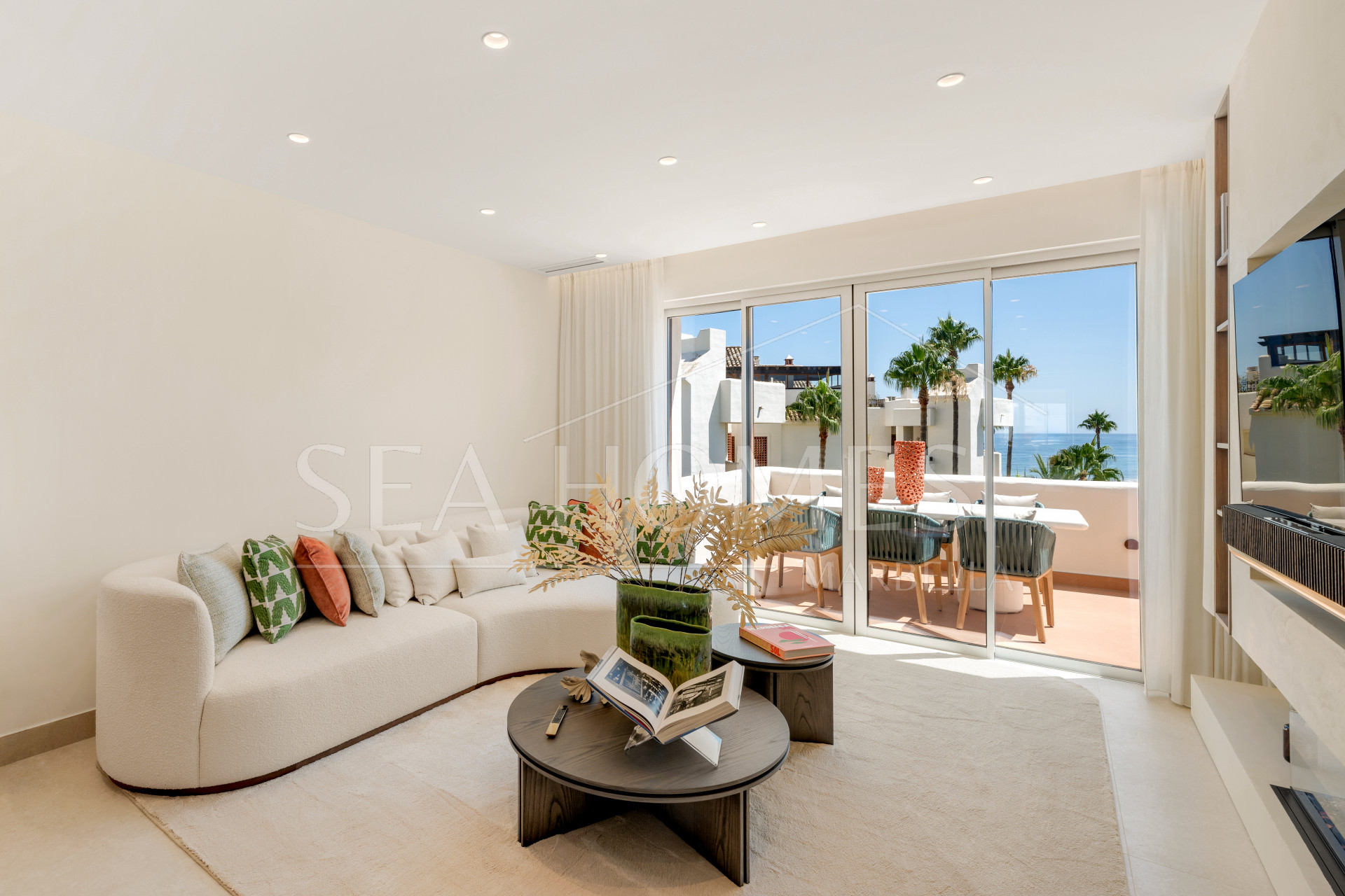 Stunning south-facing three bedroom penthouse located in the exclusive gated community of Bahia Del Velerin, Estepona.