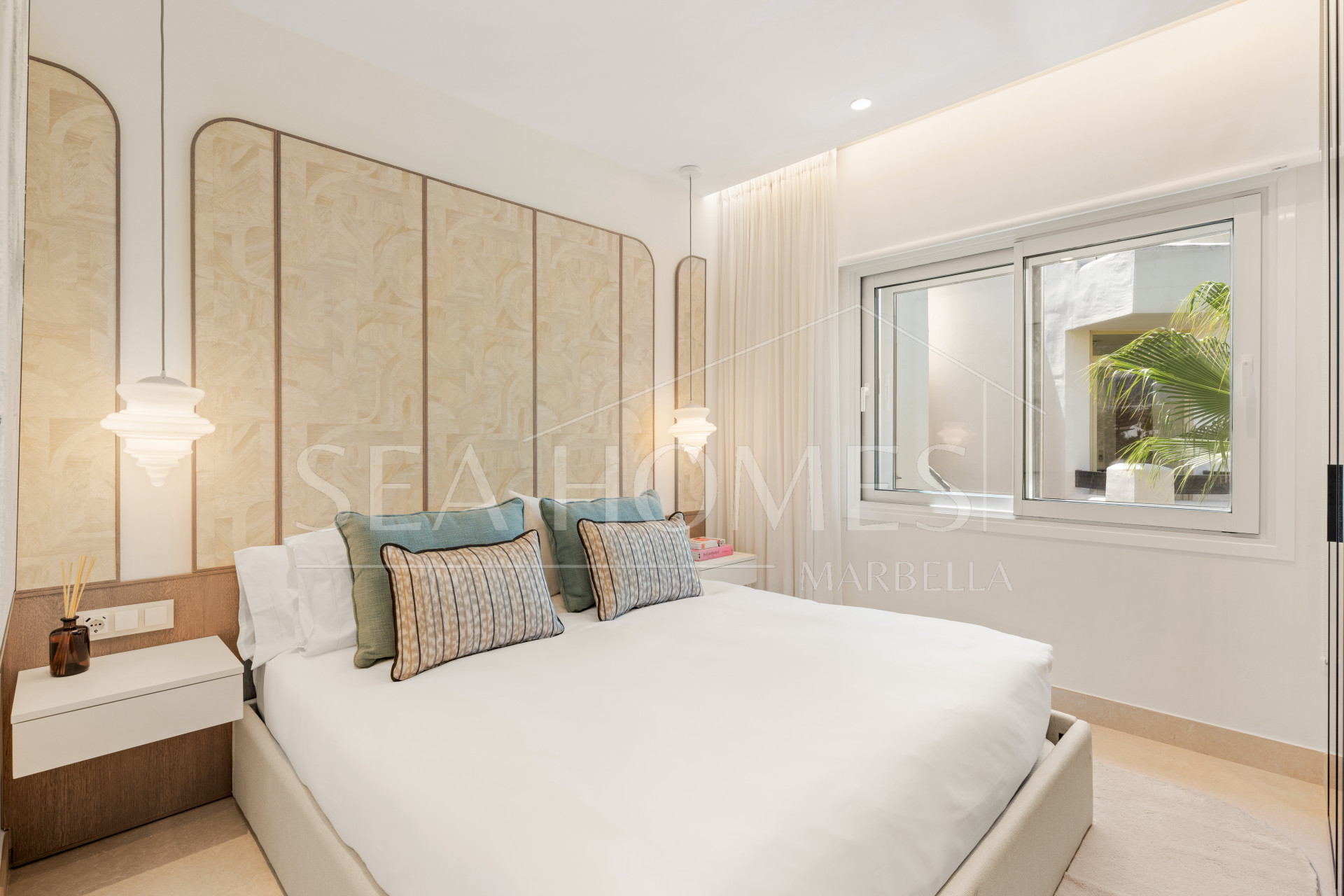 Stunning south-facing three bedroom penthouse located in the exclusive gated community of Bahia Del Velerin, Estepona.