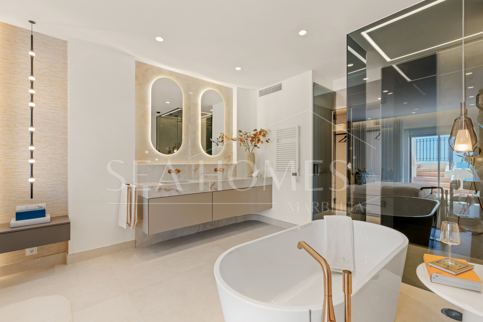 Stunning south-facing three bedroom penthouse located in the exclusive gated community of Bahia Del Velerin, Estepona.