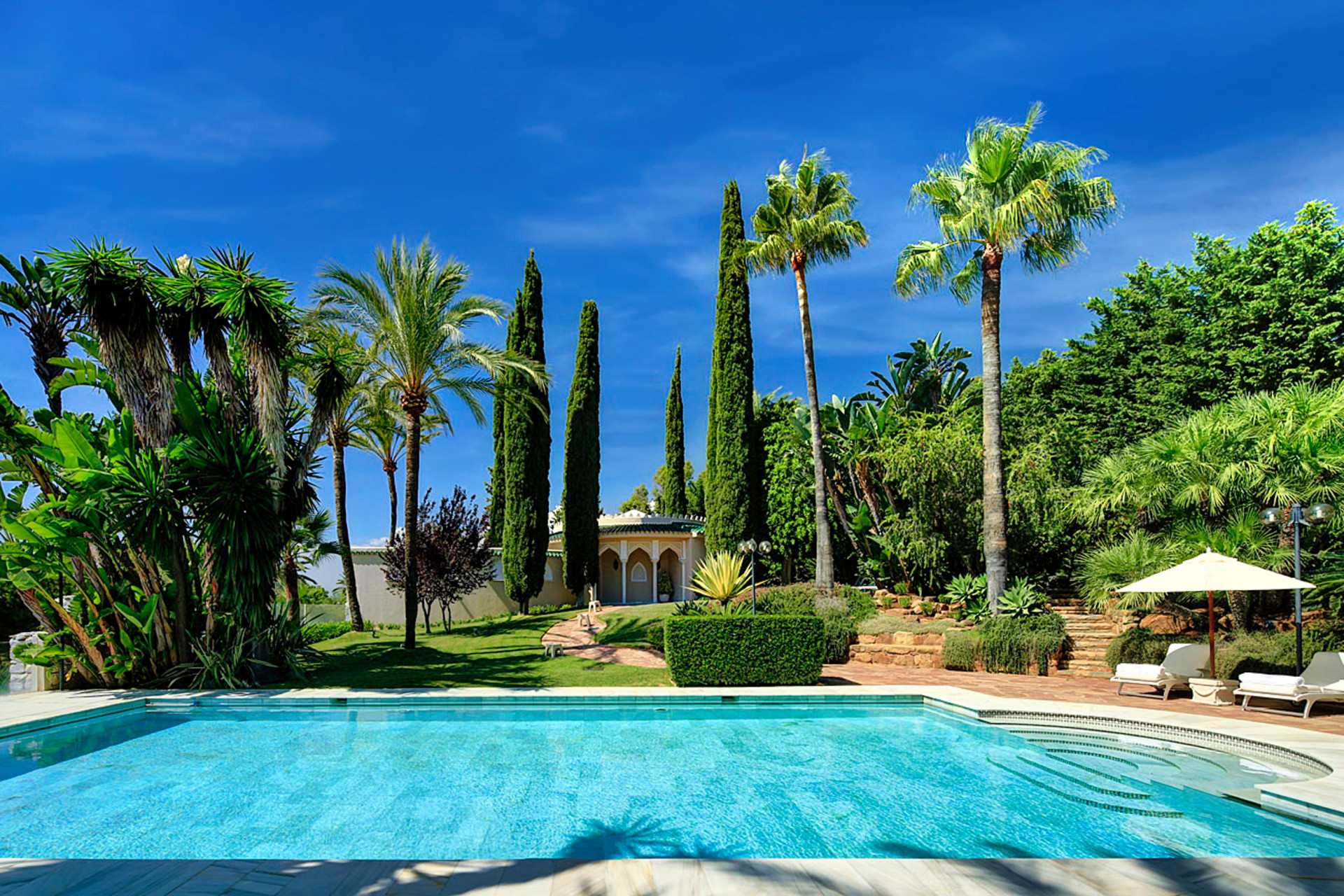 Luxury ten bedroom south-facing hilltop villa with panoramic views located in Rio Real, Marbella.