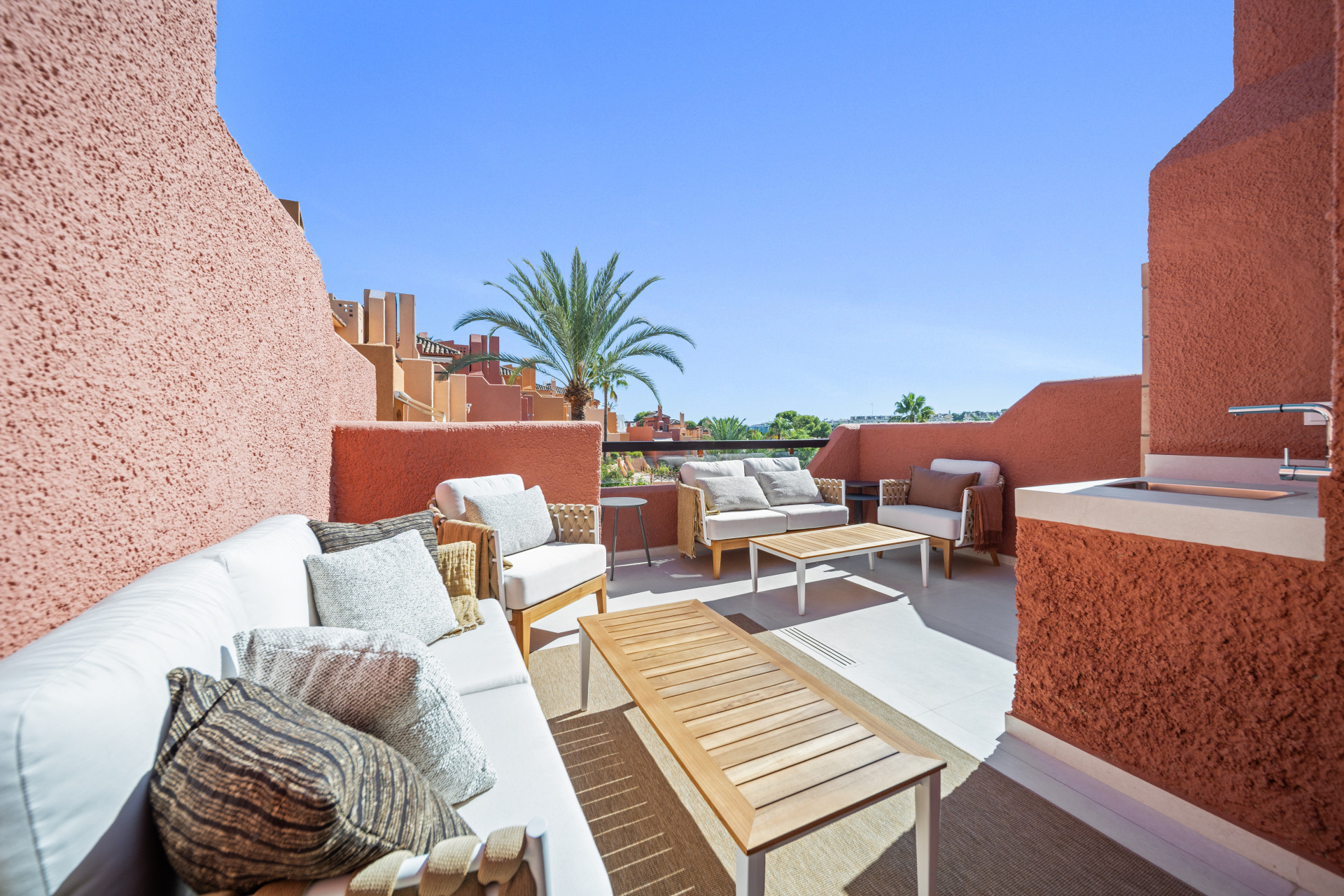 Stunning south-facing renovated three bedroom town house located in El Palmeral, Nueva Andalucía