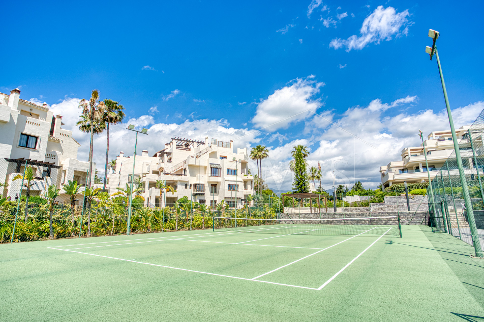 Luxurious south-facing four-bedroom duplex penthouse, frontline beach, located in a beachfront community on Marbella’s prestigious New Golden Mile with sea views.