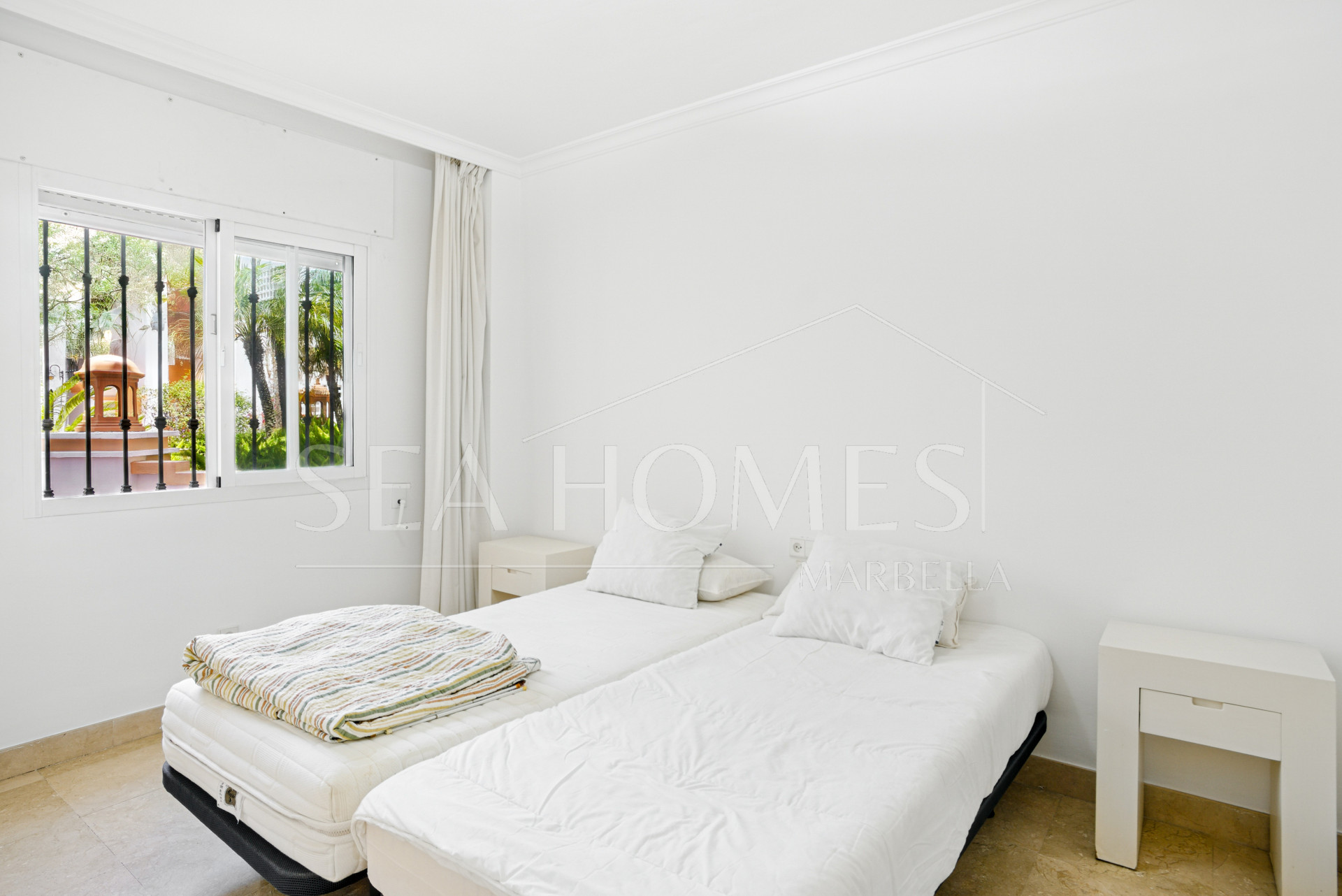 Spacious Three Bedroom, South-Facing Ground Floor Apartment in La Herradura, Marbella
