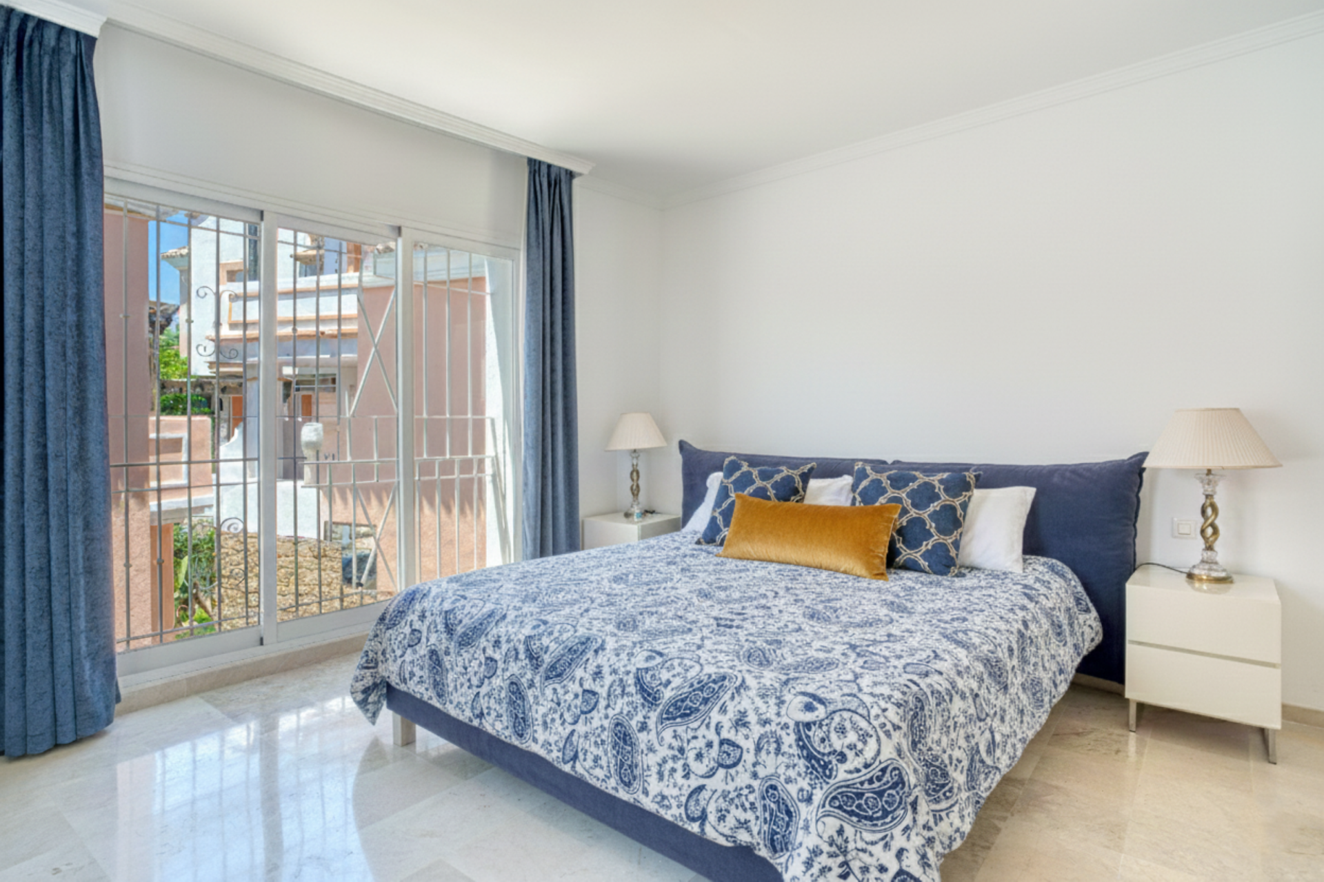 Elegant two bedroom, south west facing townhouse set within an exclusive gated community of Nueva Andalucia, Marbella