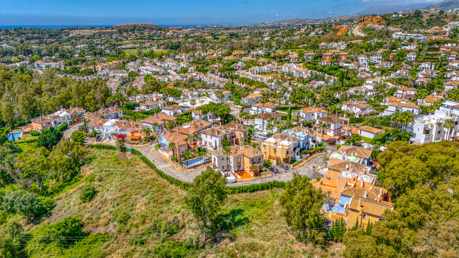 Elegant two bedroom, south west facing townhouse set within an exclusive gated community of Nueva Andalucia, Marbella
