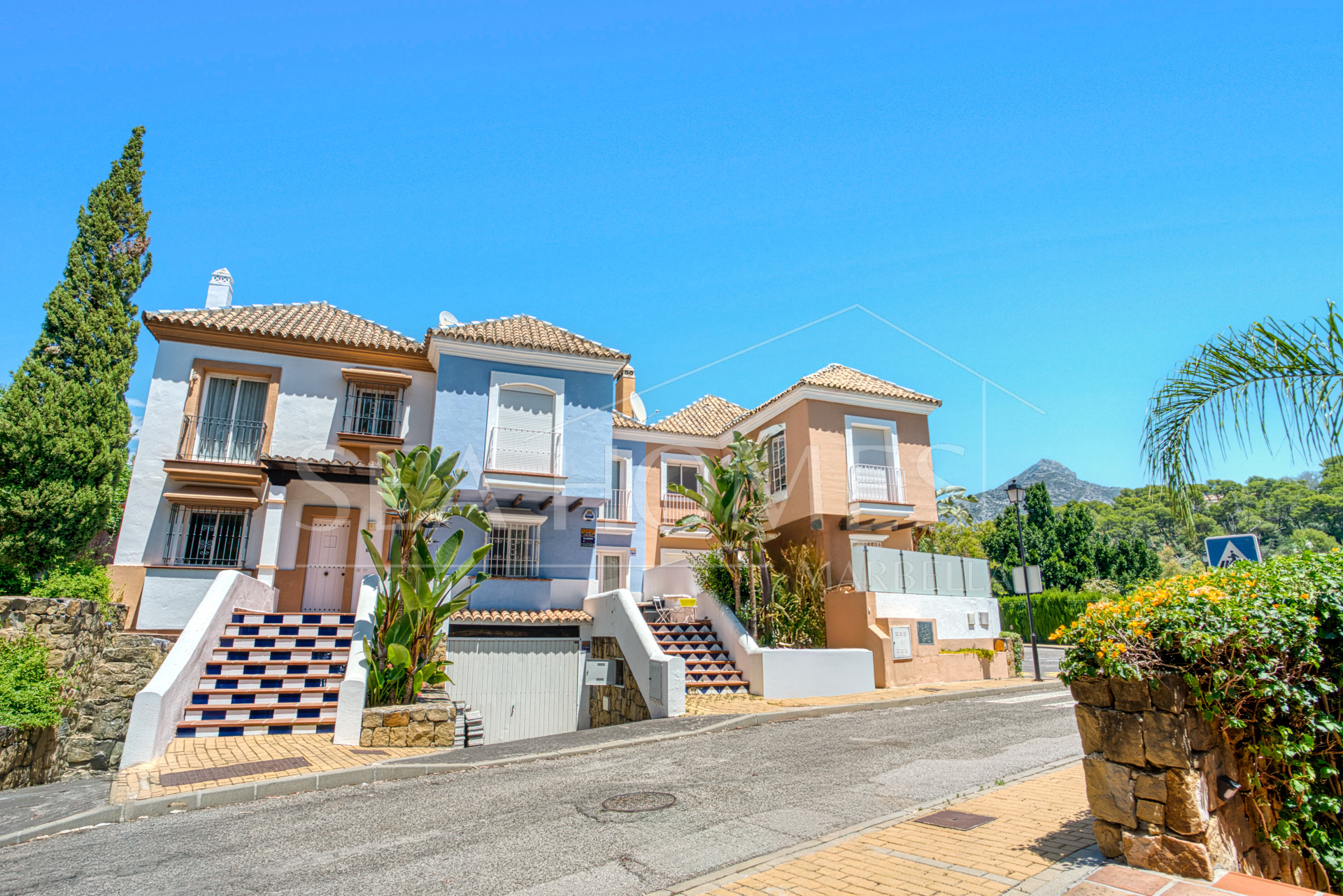Elegant two bedroom, south west facing townhouse set within an exclusive gated community of Nueva Andalucia, Marbella