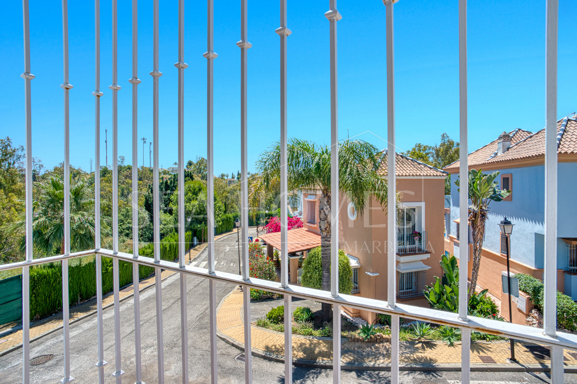 Elegant two bedroom, south west facing townhouse set within an exclusive gated community of Nueva Andalucia, Marbella