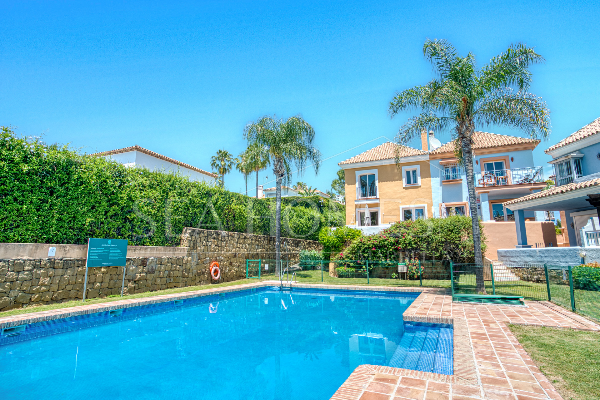 Elegant two bedroom, south west facing townhouse set within an exclusive gated community of Nueva Andalucia, Marbella