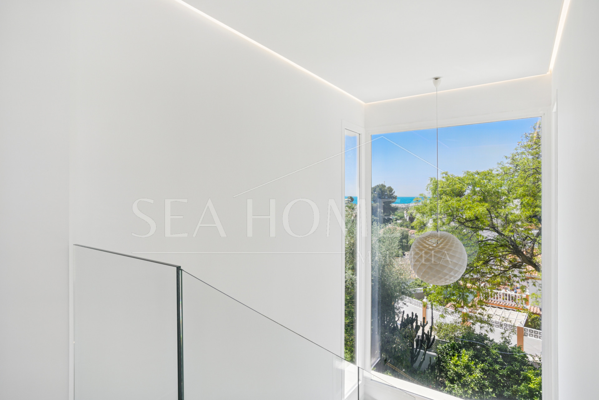 Modern, south facing six bedroom villa with sea views located in Nueva Andalucia, Marbella