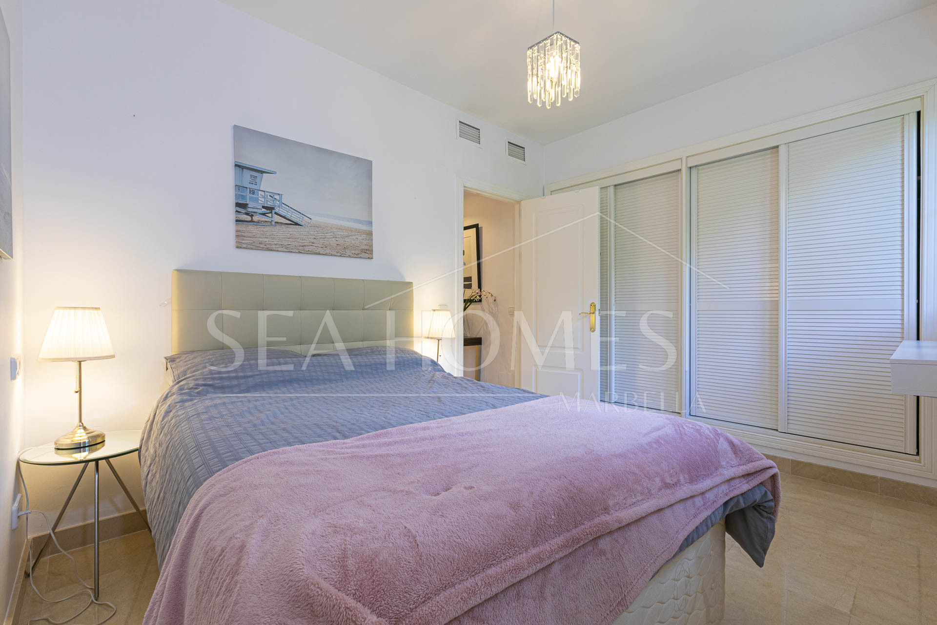 Beautiful south-facing, four bedroom townhouse in Los Almendros, part of the secure Los Arqueros Golf community in Benahavís