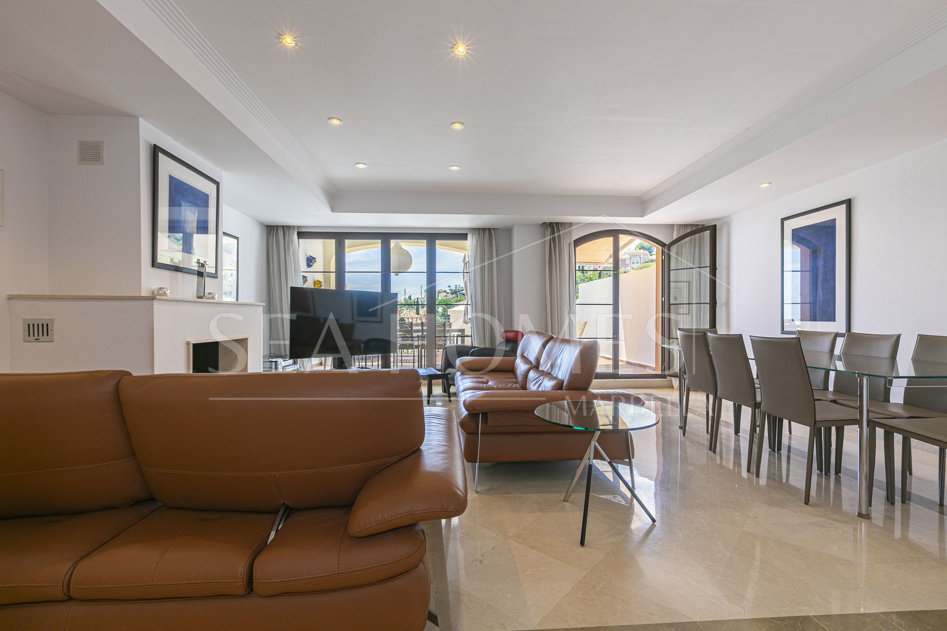 Beautiful south-facing, four bedroom townhouse in Los Almendros, part of the secure Los Arqueros Golf community in Benahavís