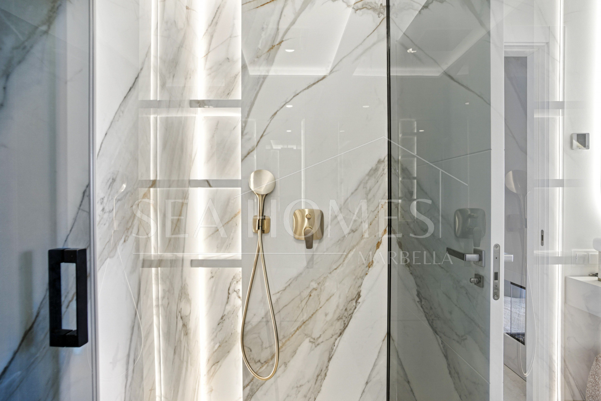 Impeccably renovated, south facing beach front, garden apartment located in the exclusive Menara Beach community on the sought-after New Golden Mile