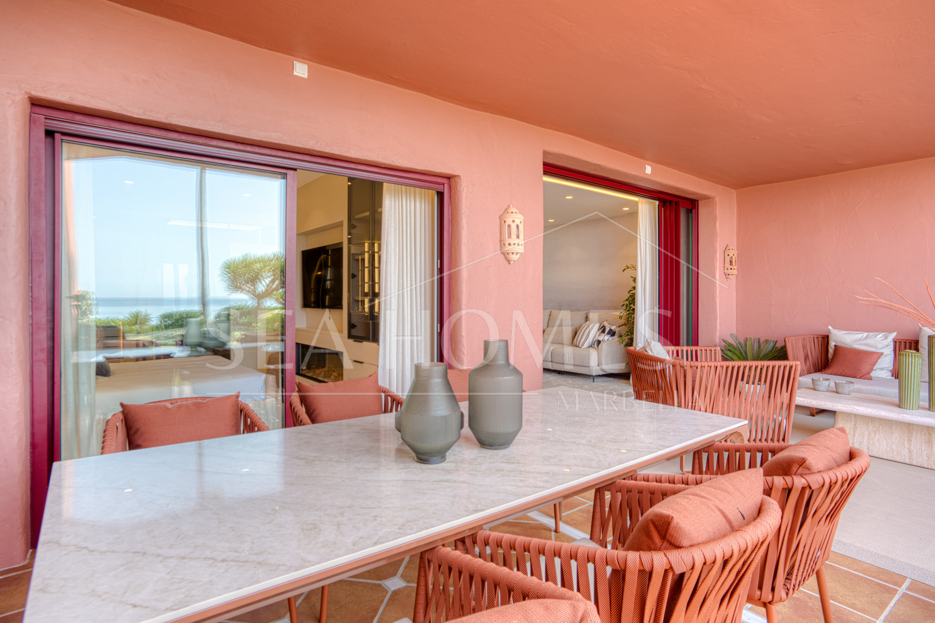 Impeccably renovated, south facing beach front, garden apartment located in the exclusive Menara Beach community on the sought-after New Golden Mile