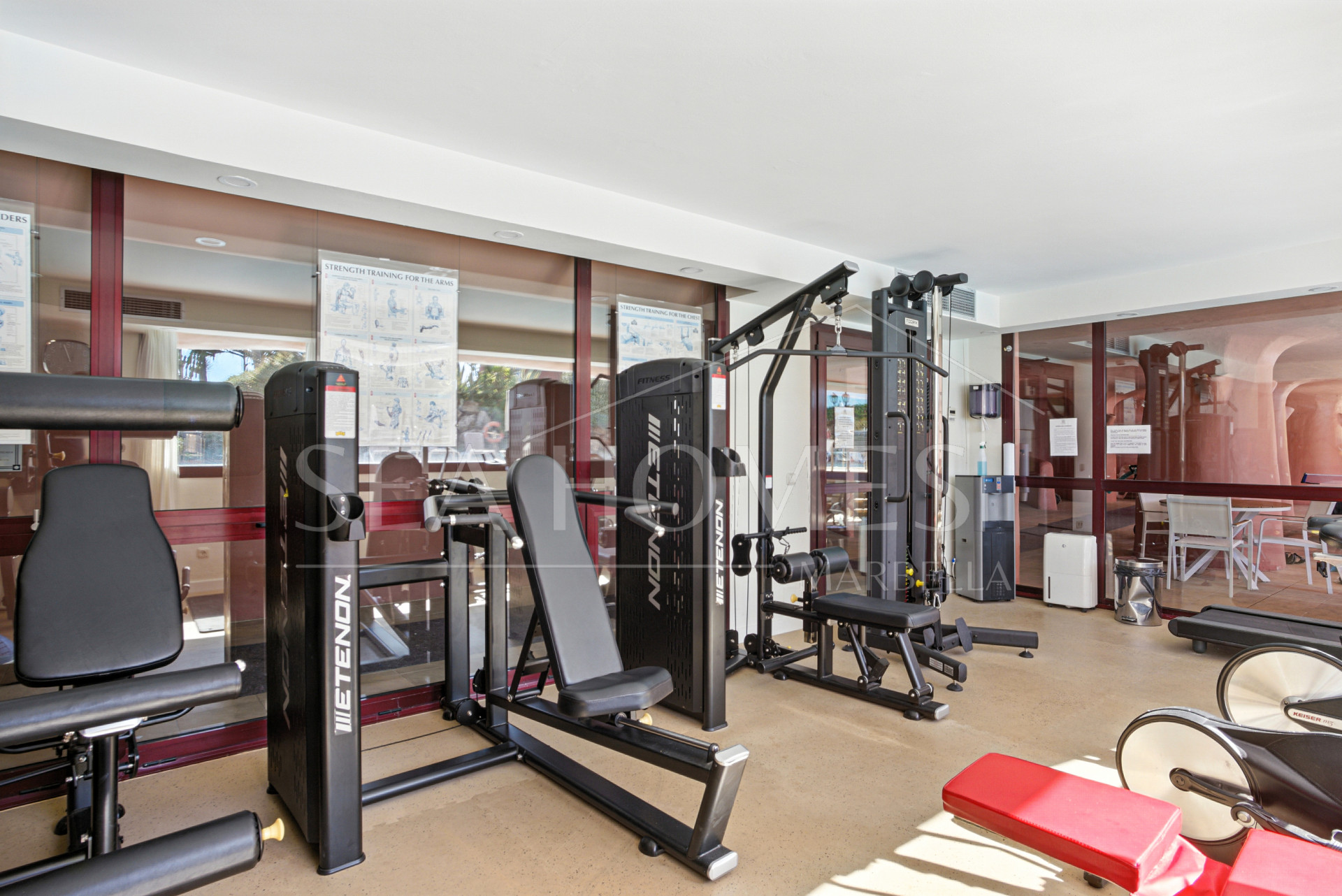 Impeccably renovated, south facing beach front, garden apartment located in the exclusive Menara Beach community on the sought-after New Golden Mile