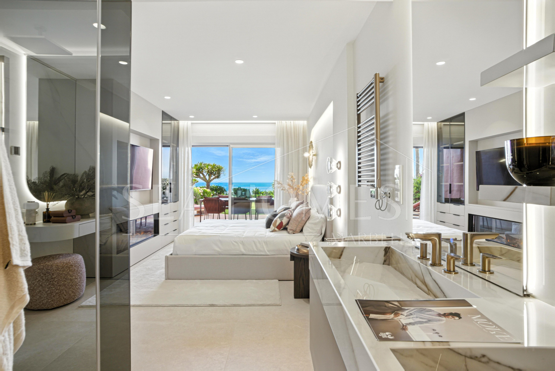 Impeccably renovated, south facing beach front, garden apartment located in the exclusive Menara Beach community on the sought-after New Golden Mile
