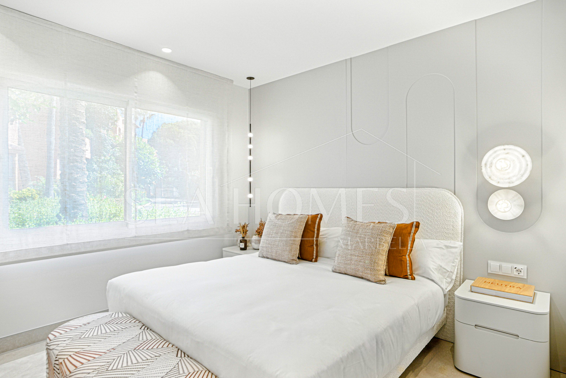 Impeccably renovated, south facing beach front, garden apartment located in the exclusive Menara Beach community on the sought-after New Golden Mile