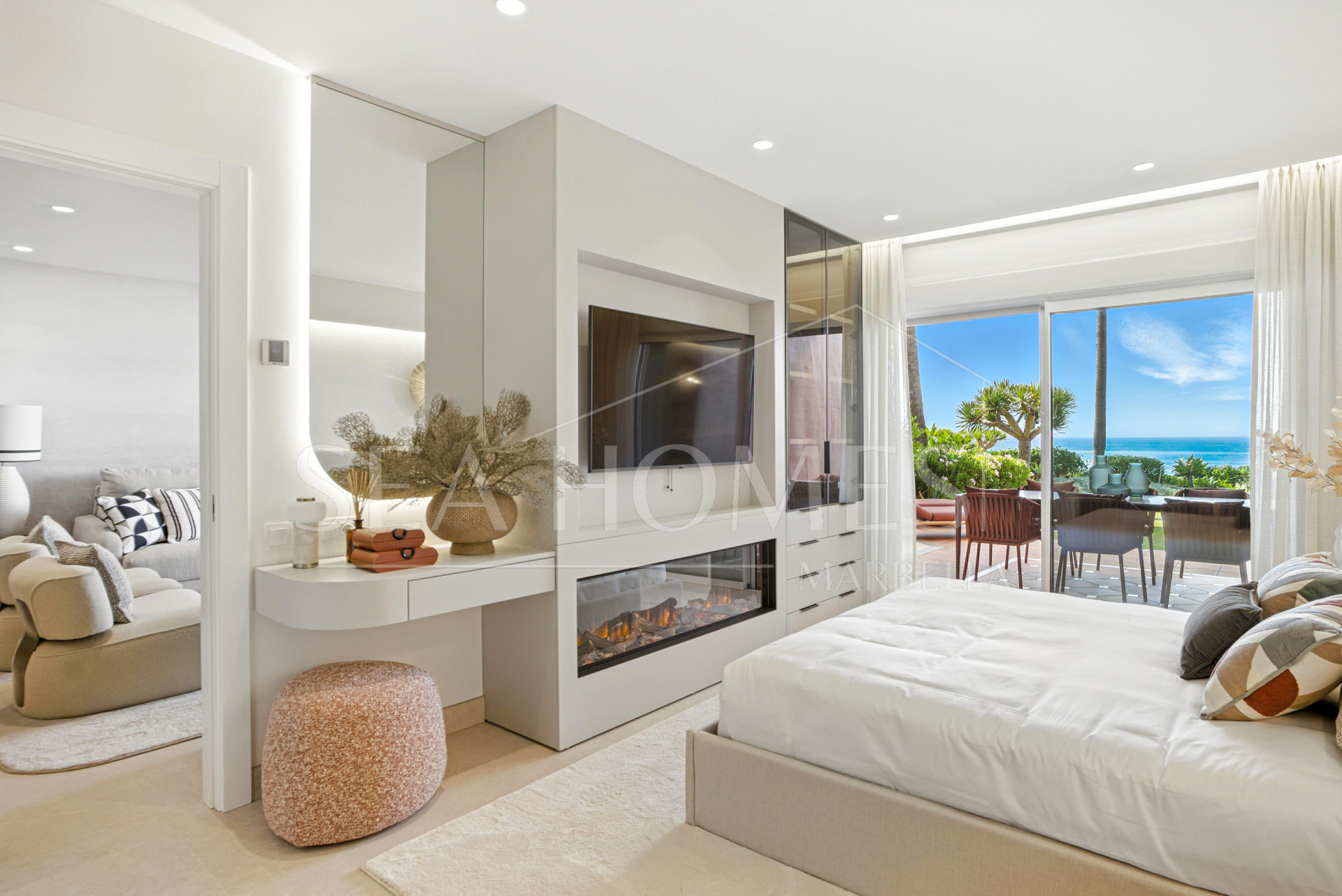 Impeccably renovated, south facing beach front, garden apartment located in the exclusive Menara Beach community on the sought-after New Golden Mile