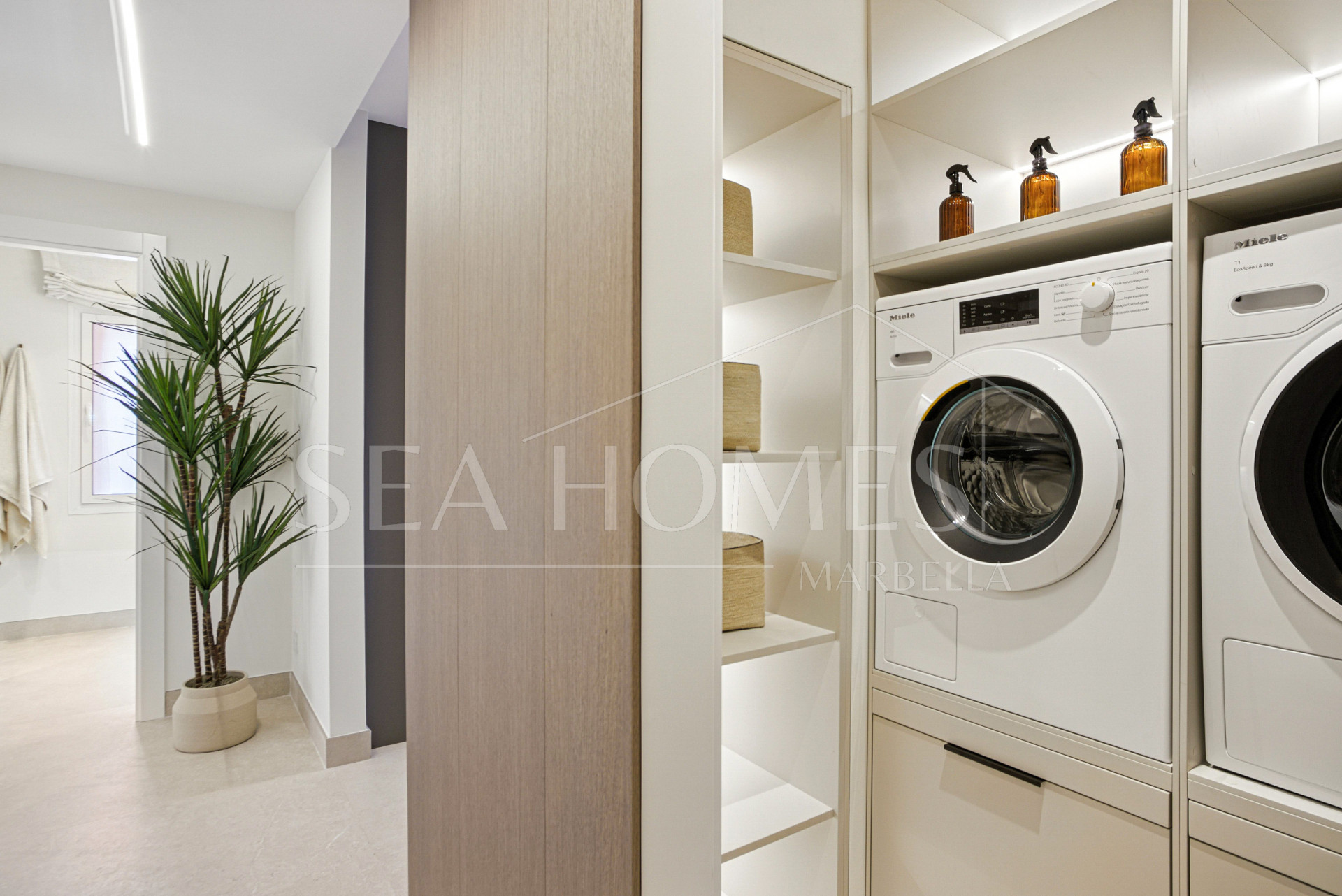 Impeccably renovated, south facing beach front, garden apartment located in the exclusive Menara Beach community on the sought-after New Golden Mile