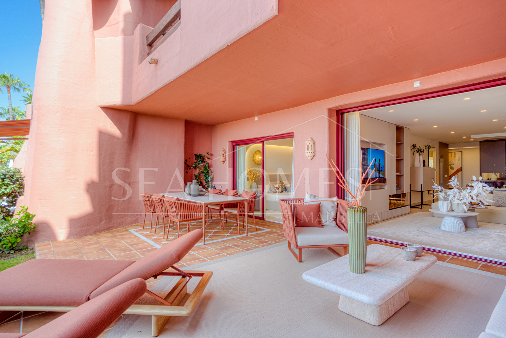 Impeccably renovated, south facing beach front, garden apartment located in the exclusive Menara Beach community on the sought-after New Golden Mile