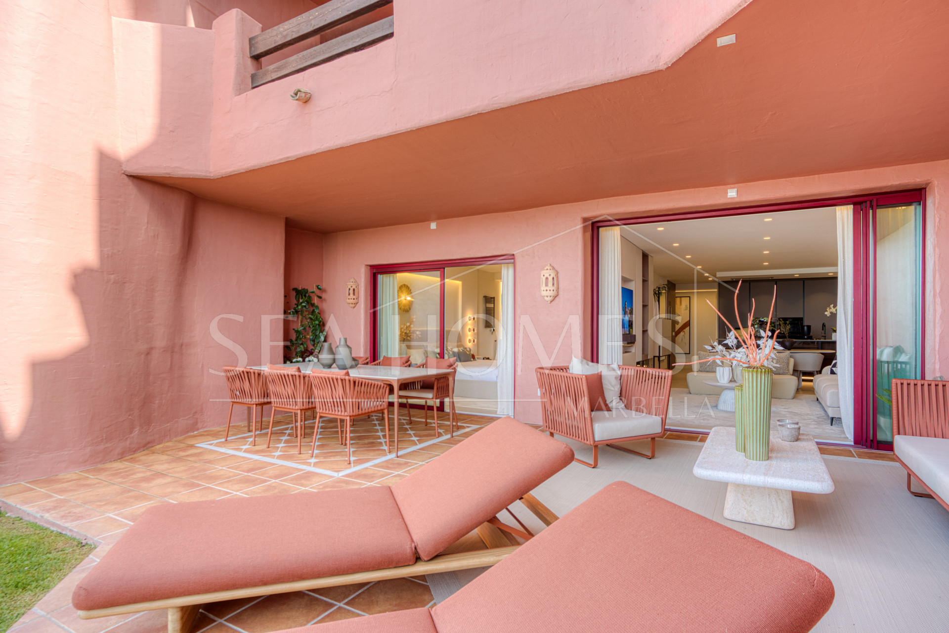 Impeccably renovated, south facing beach front, garden apartment located in the exclusive Menara Beach community on the sought-after New Golden Mile