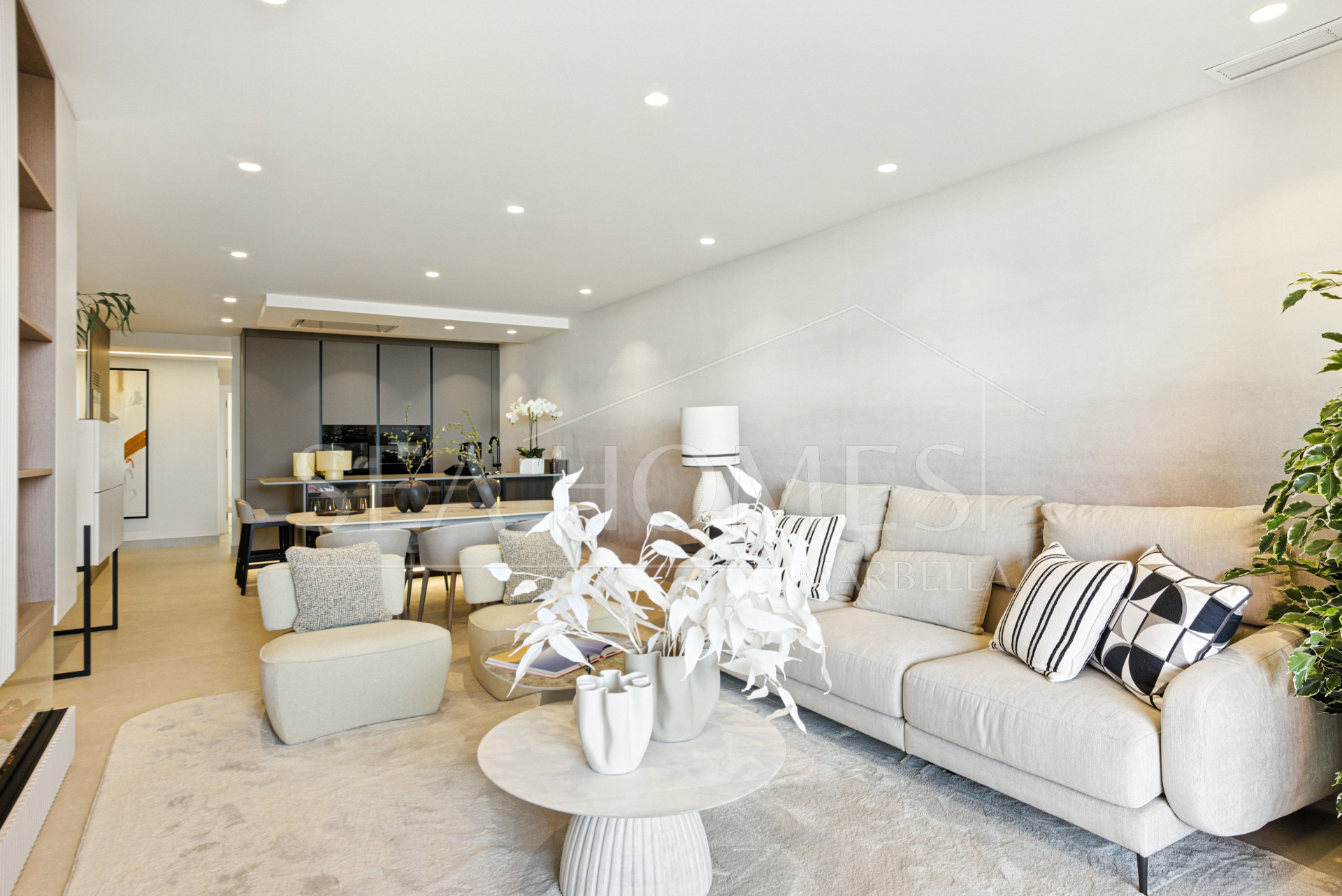 Impeccably renovated, south facing beach front, garden apartment located in the exclusive Menara Beach community on the sought-after New Golden Mile