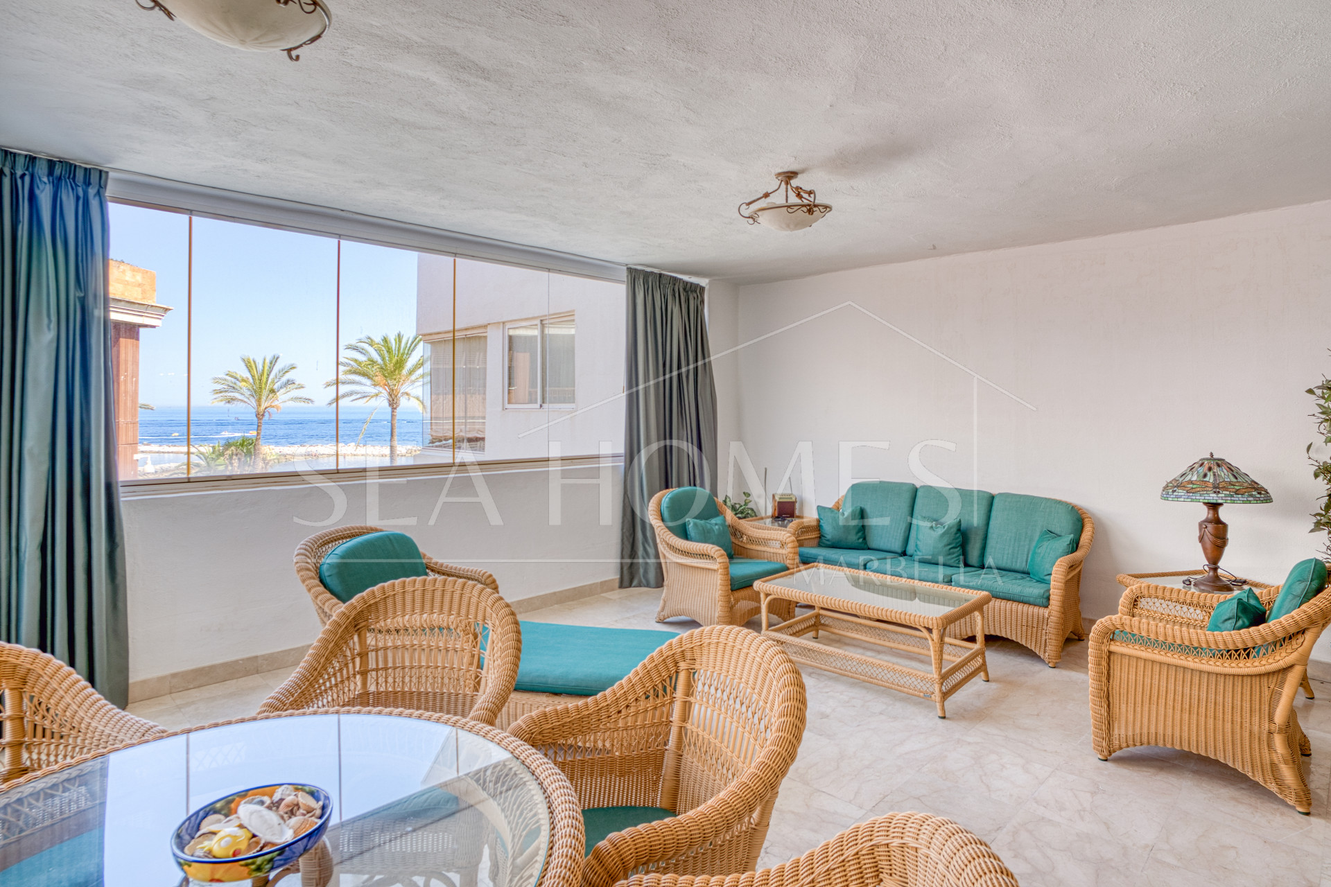 Exclusive Beachfront Two-Bedroom South-Facing Apartment with Sea Views in La Herradura, Marbella