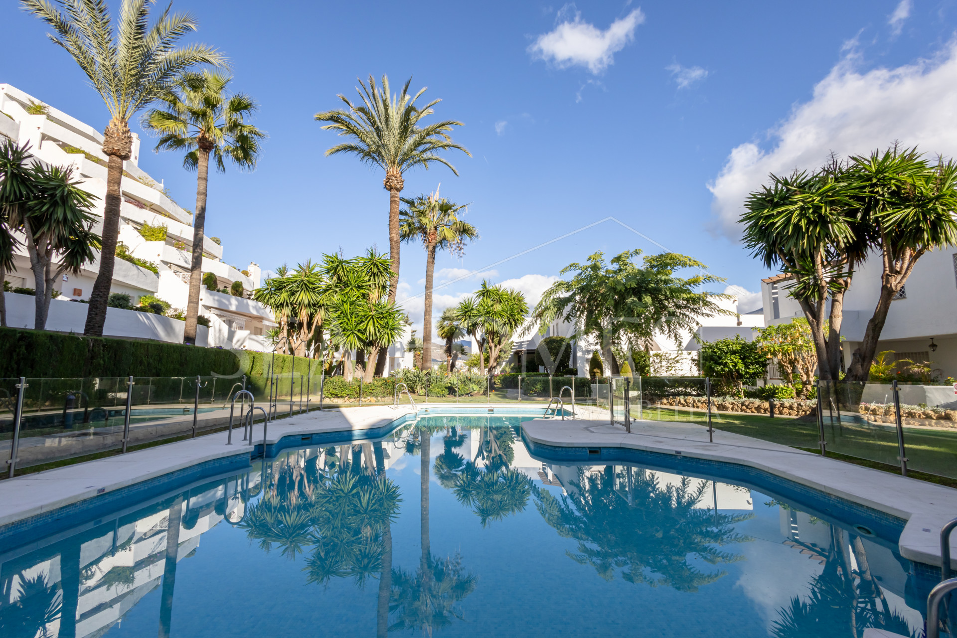 Beautifully reformed two bedroom apartment in the gated community of Jardines de Andalucía, Nueva Andalucia with sea views