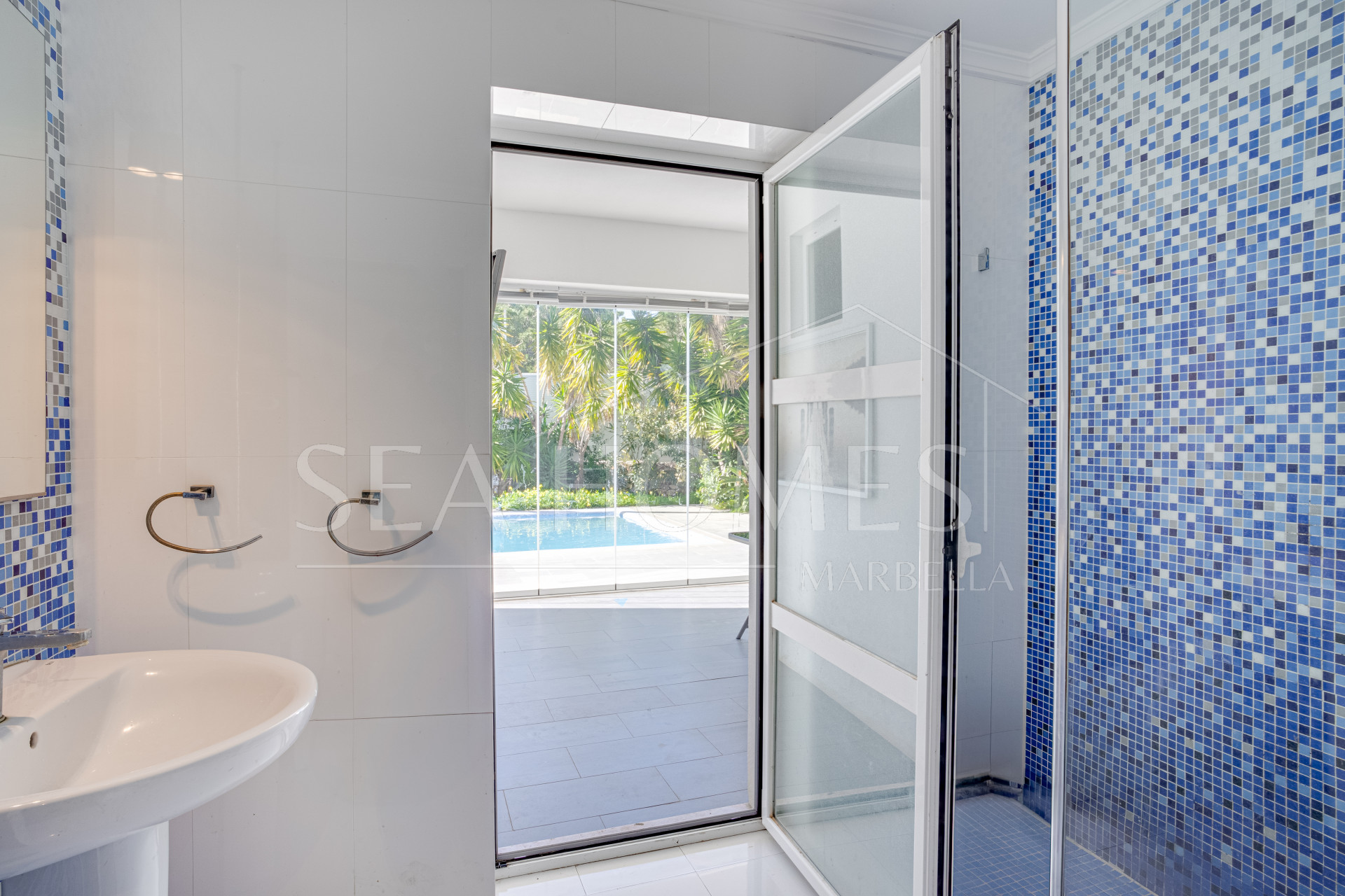 Unique eight bedroom south facing villa, in a tranquil area of Elviria, Marbella boasting sea views