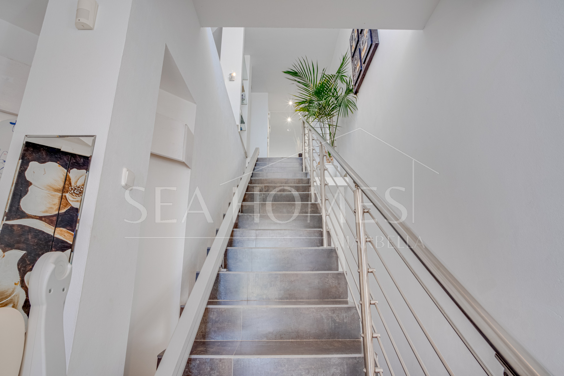 Unique eight bedroom south facing villa, in a tranquil area of Elviria, Marbella boasting sea views