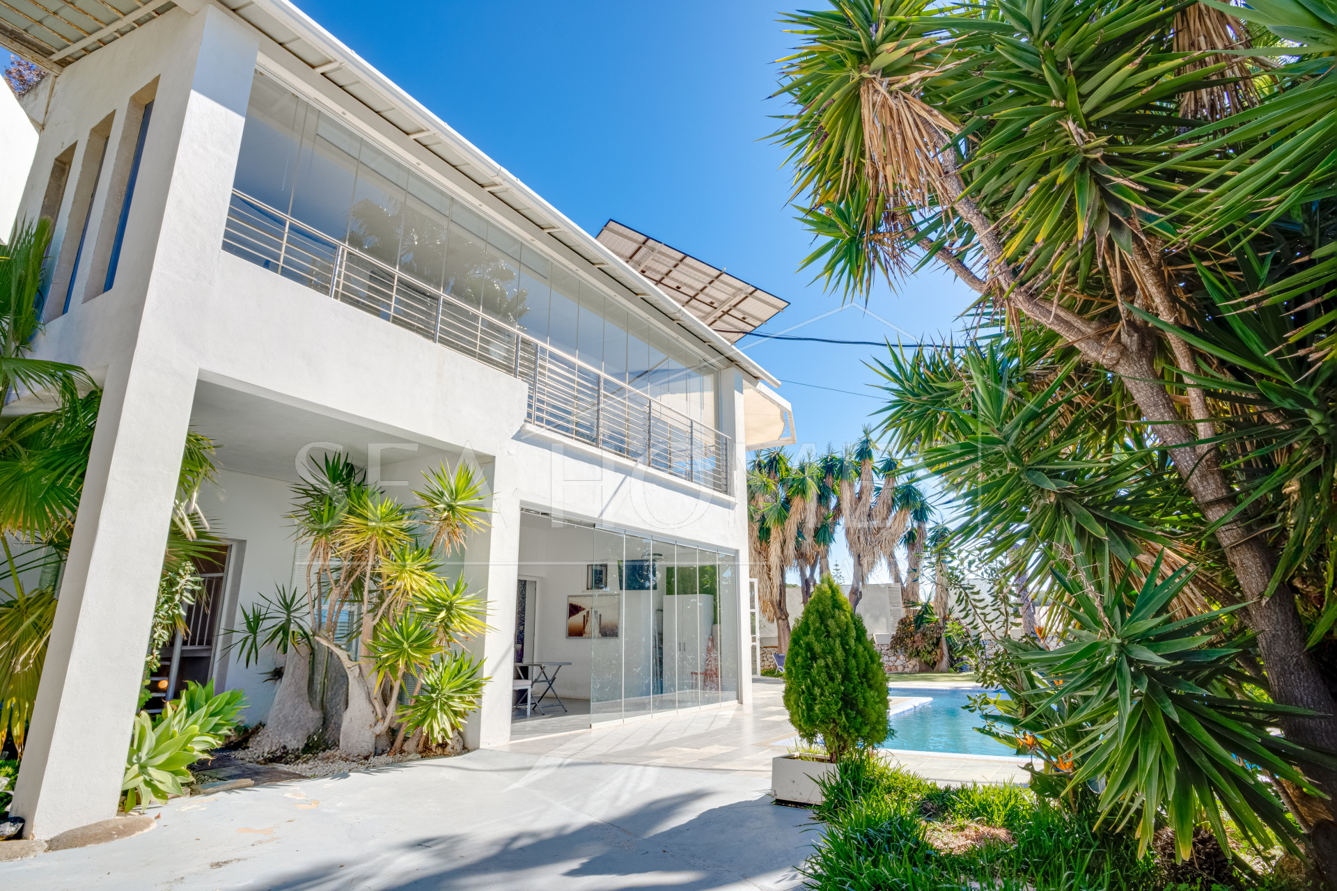 Unique eight bedroom south facing villa, in a tranquil area of Elviria, Marbella boasting sea views