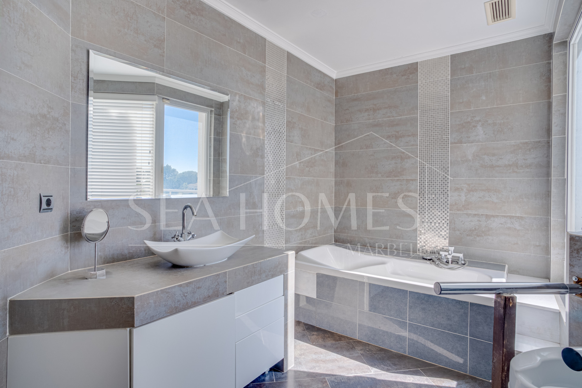 Unique eight bedroom south facing villa, in a tranquil area of Elviria, Marbella boasting sea views