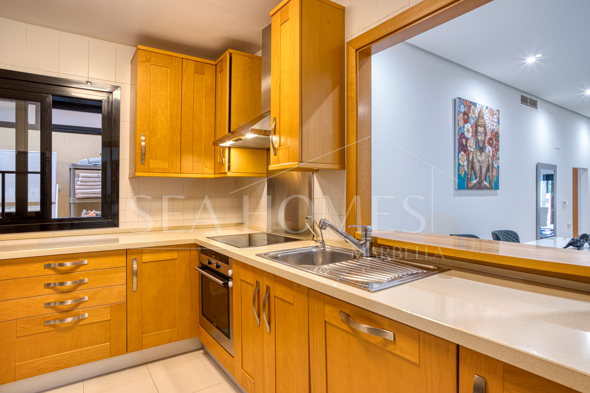 Fantastic west-facing three-bedroom apartment in Las Mimosas Beach Gardens, Nueva Andalucía.