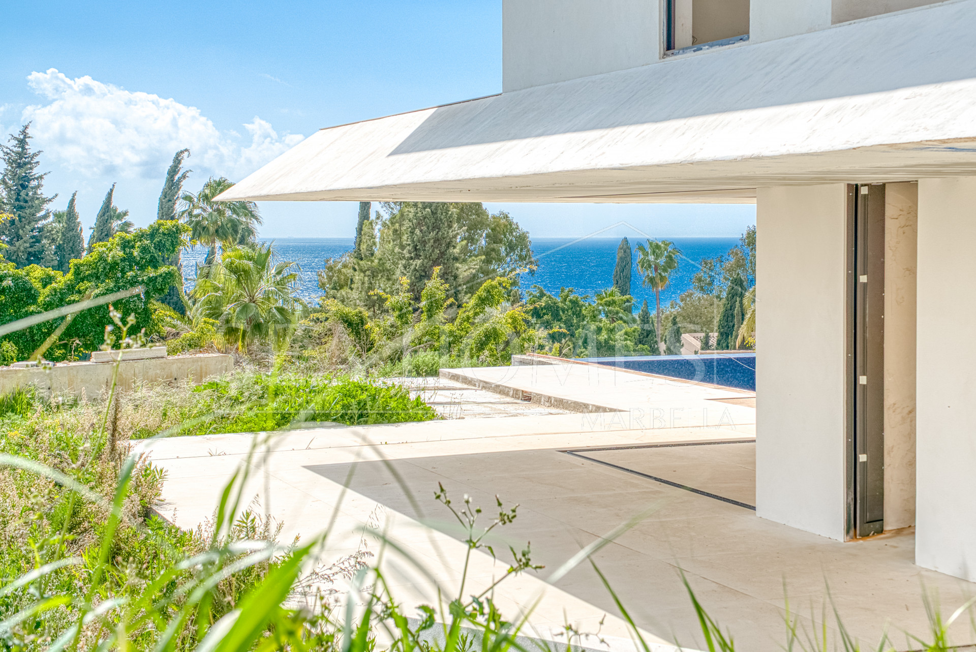 Experience unparalleled luxury with this soon-to-be-completed turnkey villa in the prestigious Hacienda Las Chapas